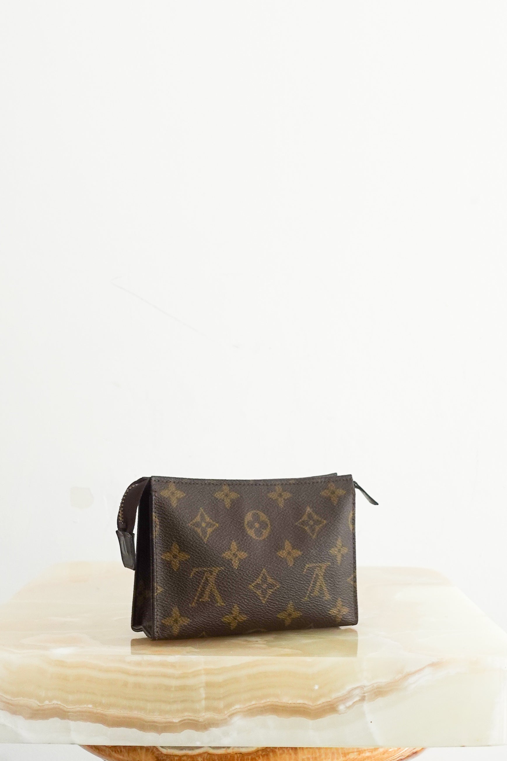 Monogram canvas toiletry pouch