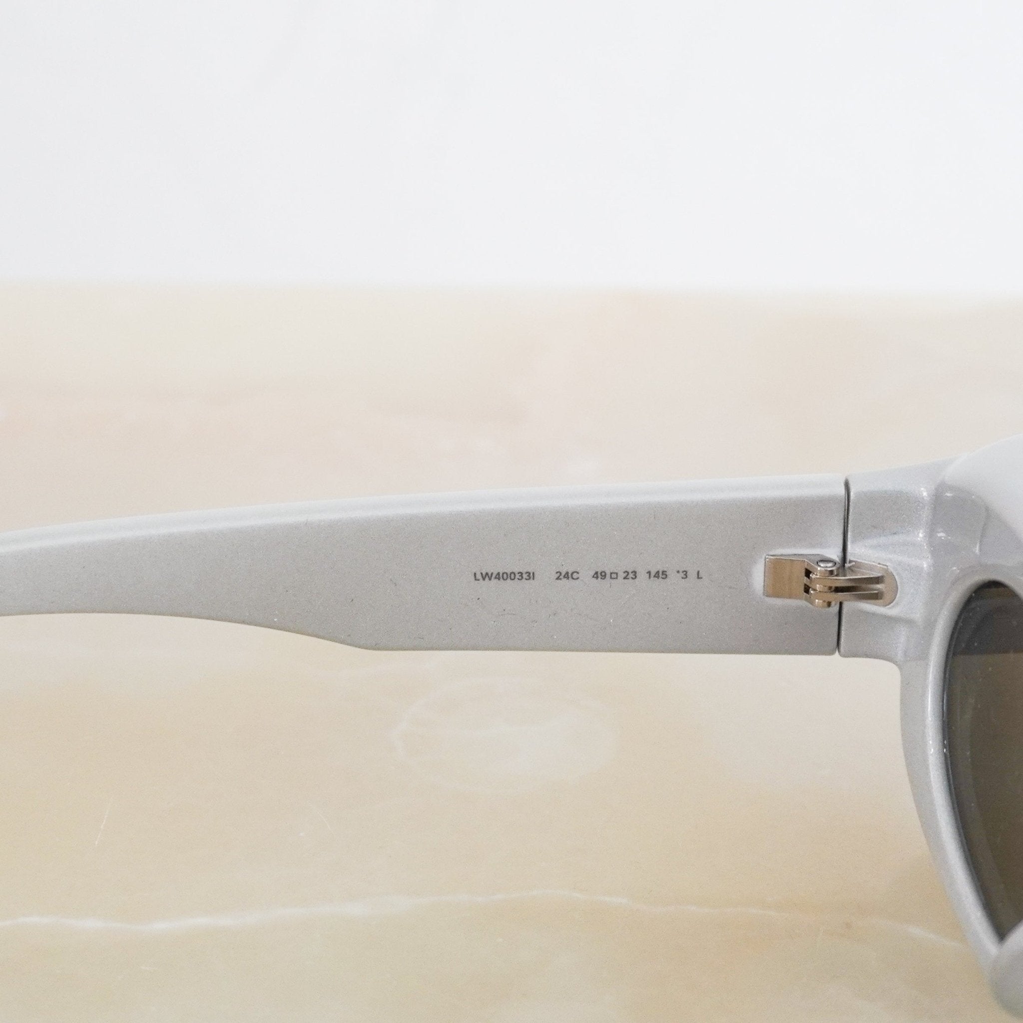 Loewe grey sunglasses RRP £300 | Authentic Preloved - Reloved Again