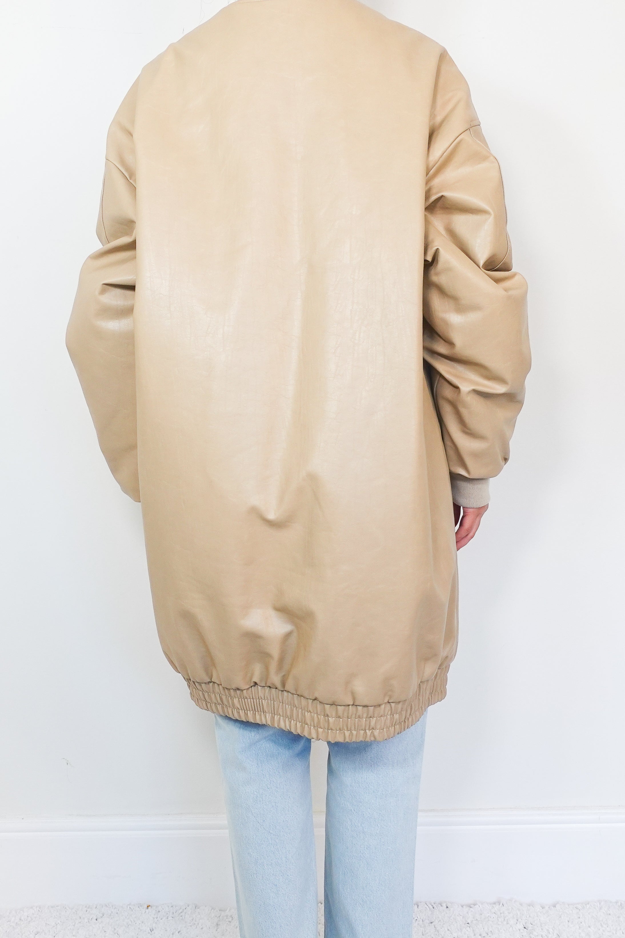 Oversized beige faux-leather bomber jacket RRP £400