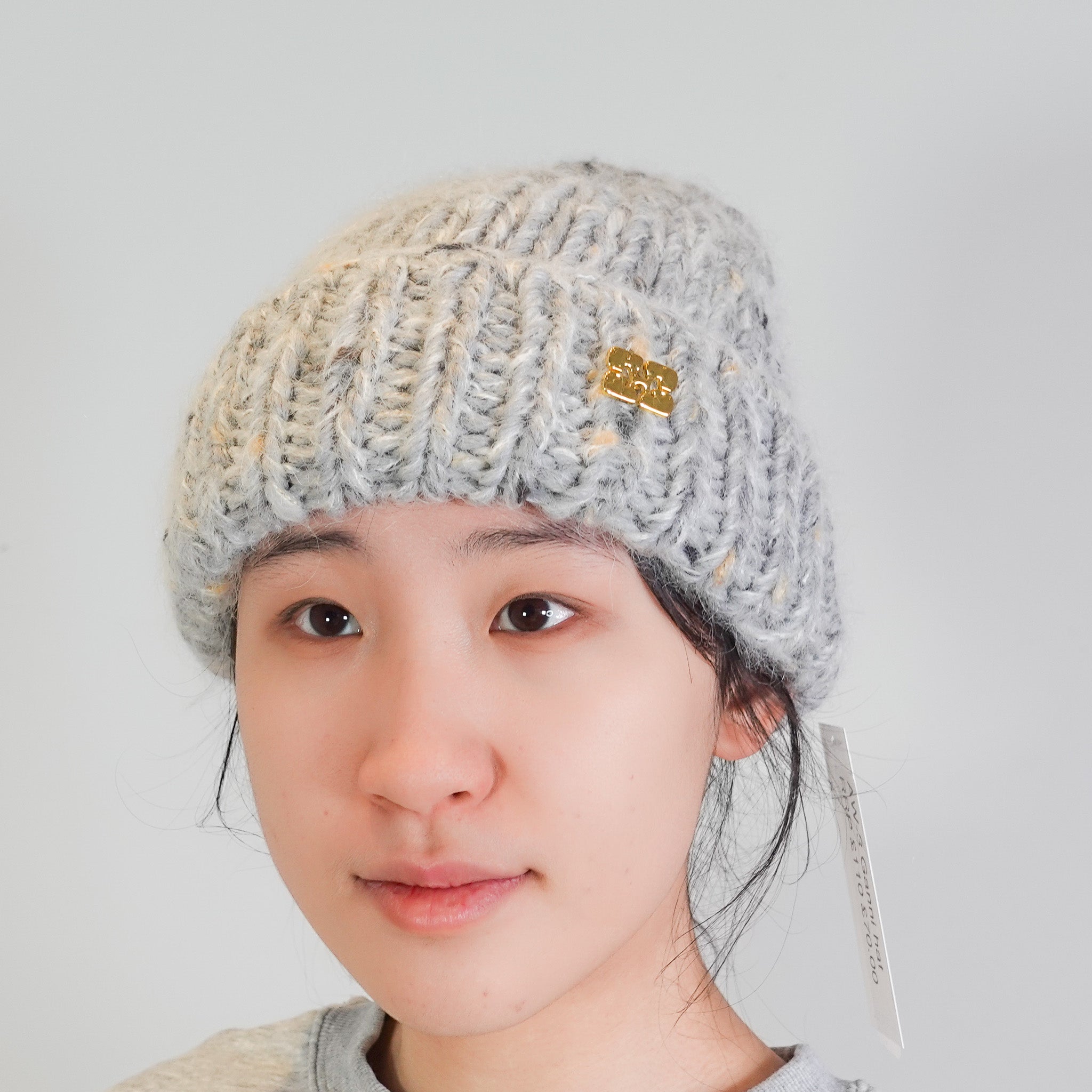 Grey knitted hat RRP £110