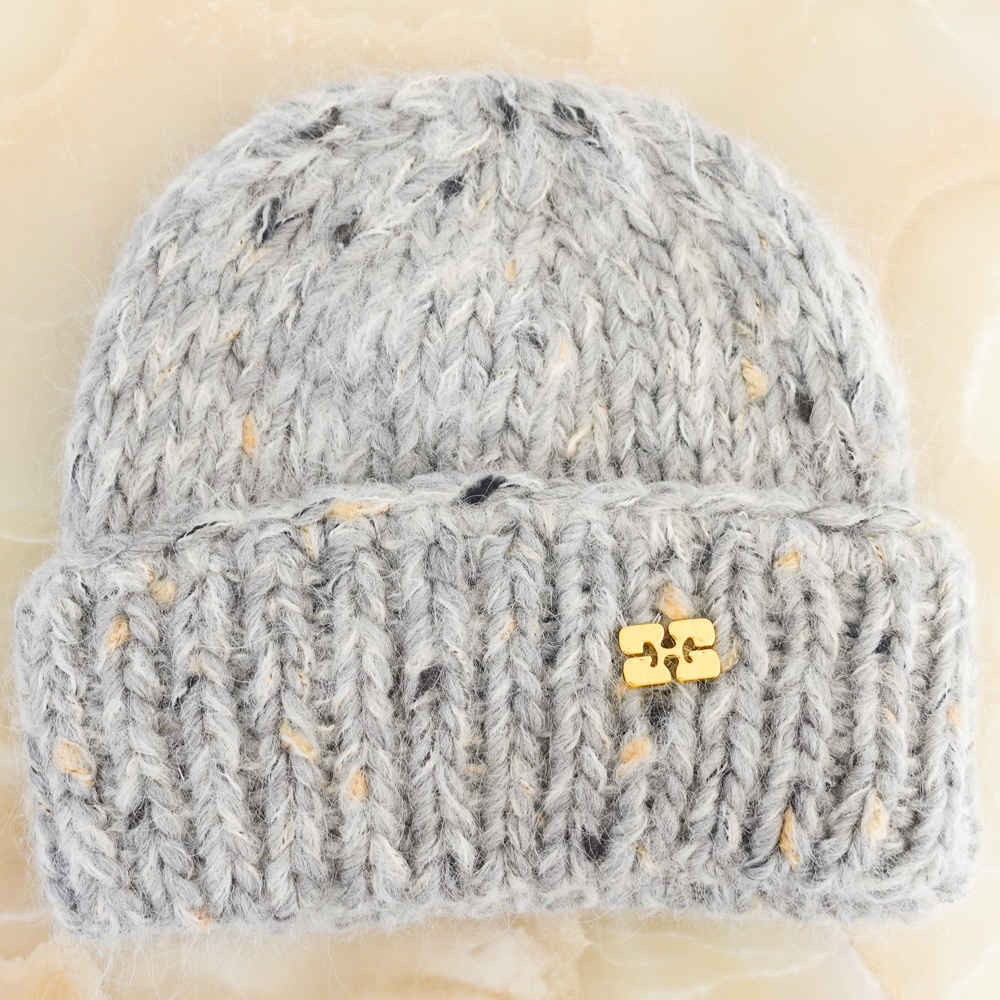 Grey knitted hat RRP £110