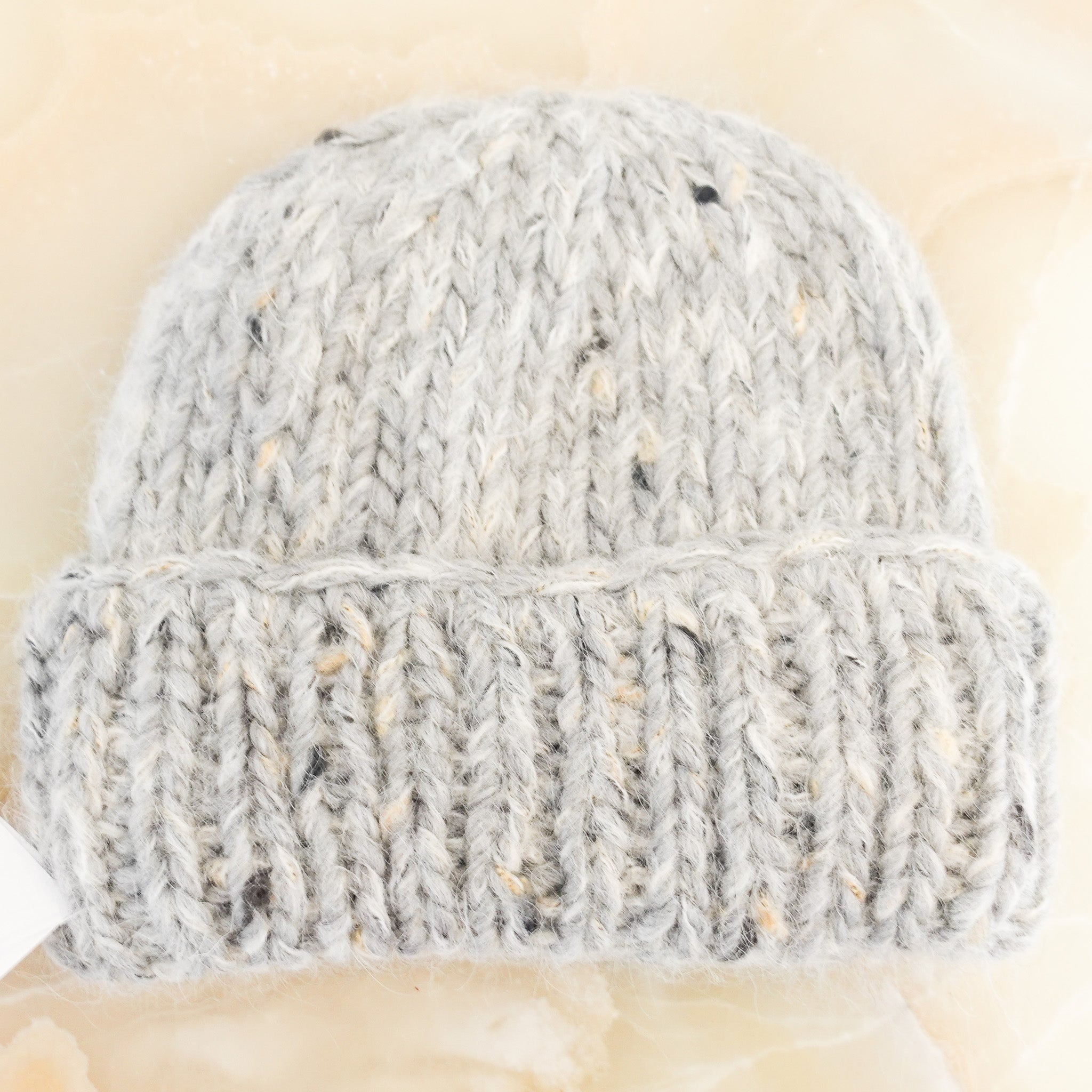 Grey knitted hat RRP £110