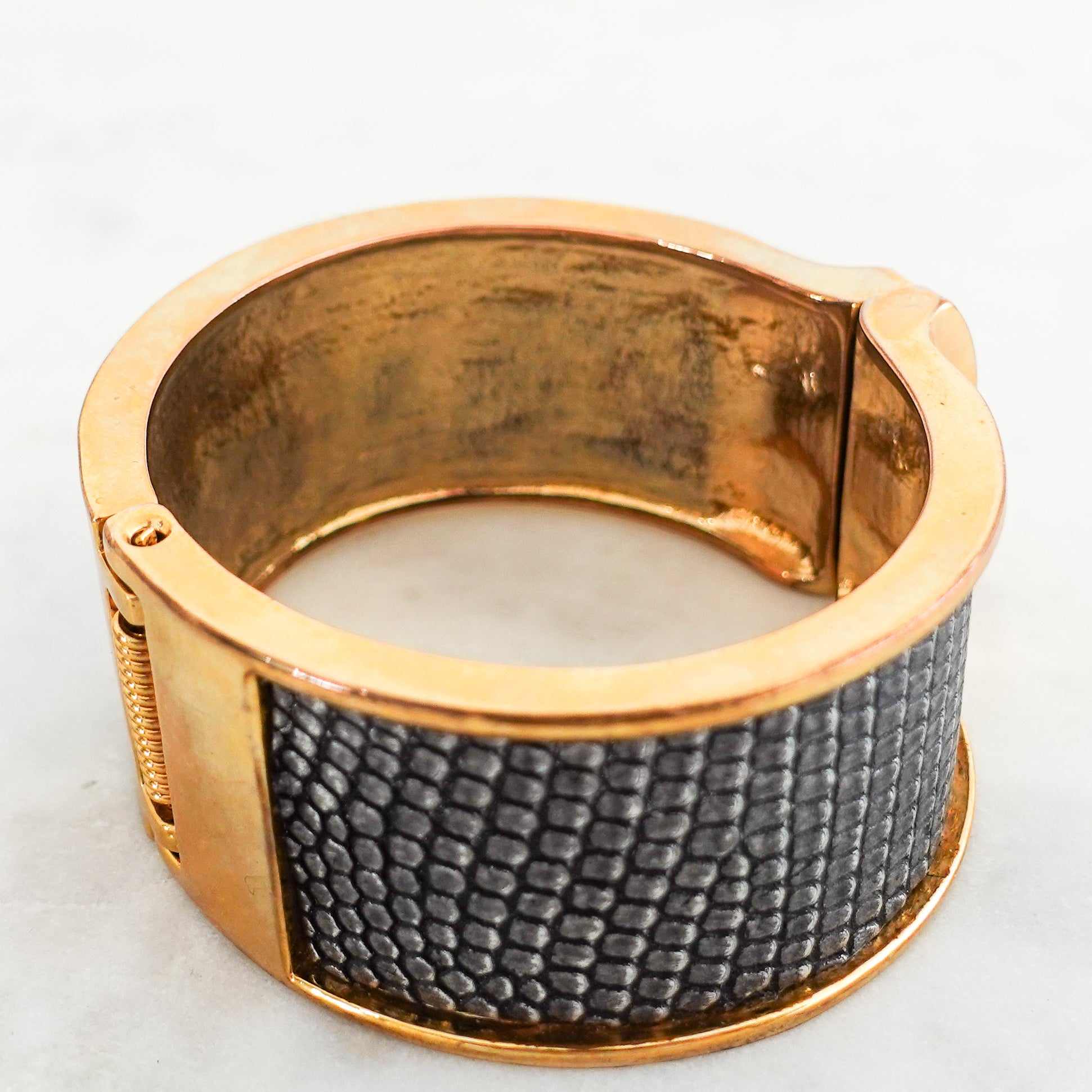 Stamped leather and gold plated cuff bracelet