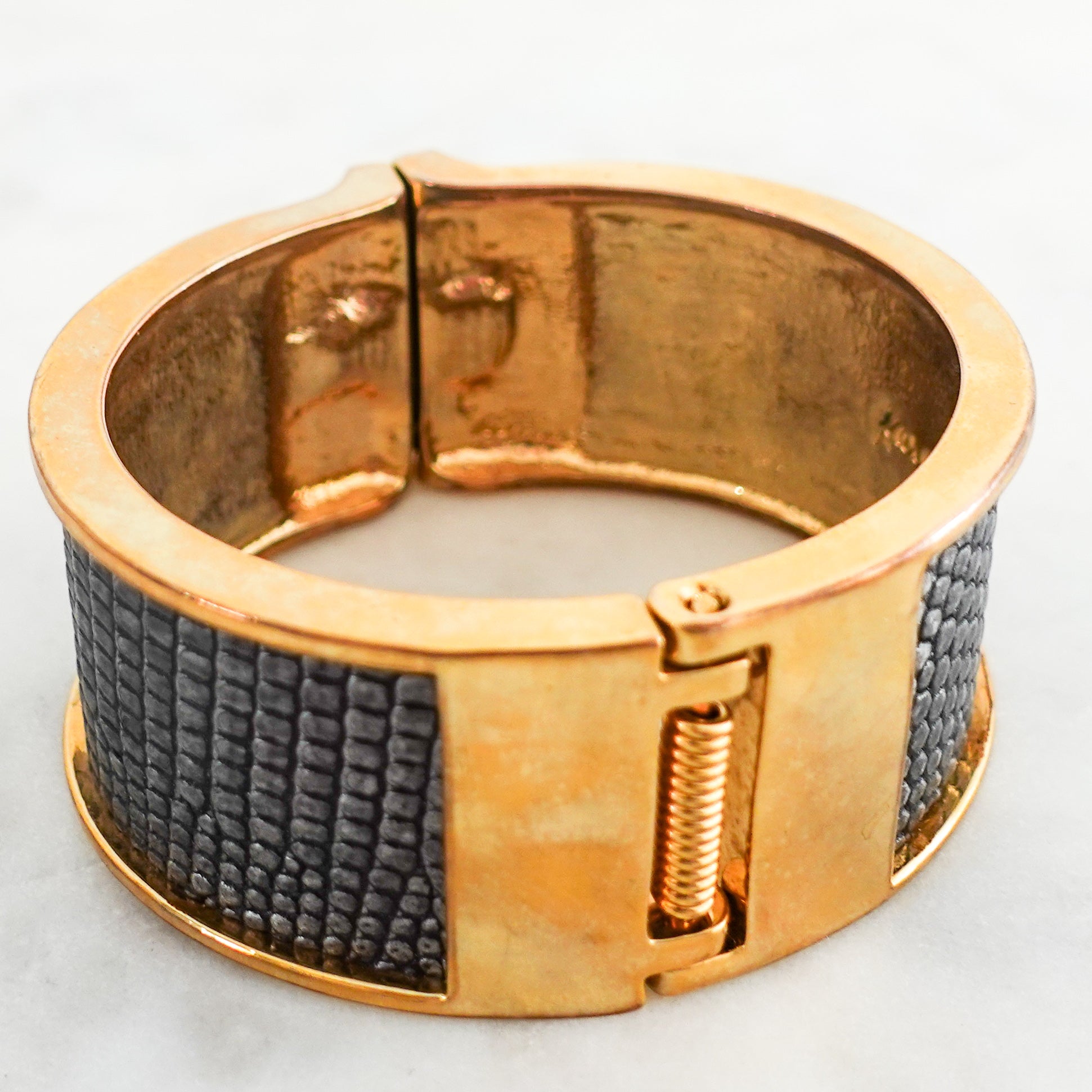 Stamped leather and gold plated cuff bracelet