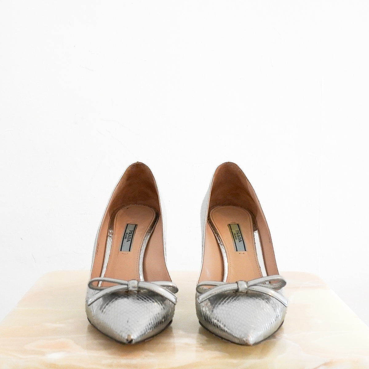 Prada Metallic Silver Snakeskin-Effect Bow Pointed-Toe Pumps (RRP £595) | Authentic Preloved - Reloved Again