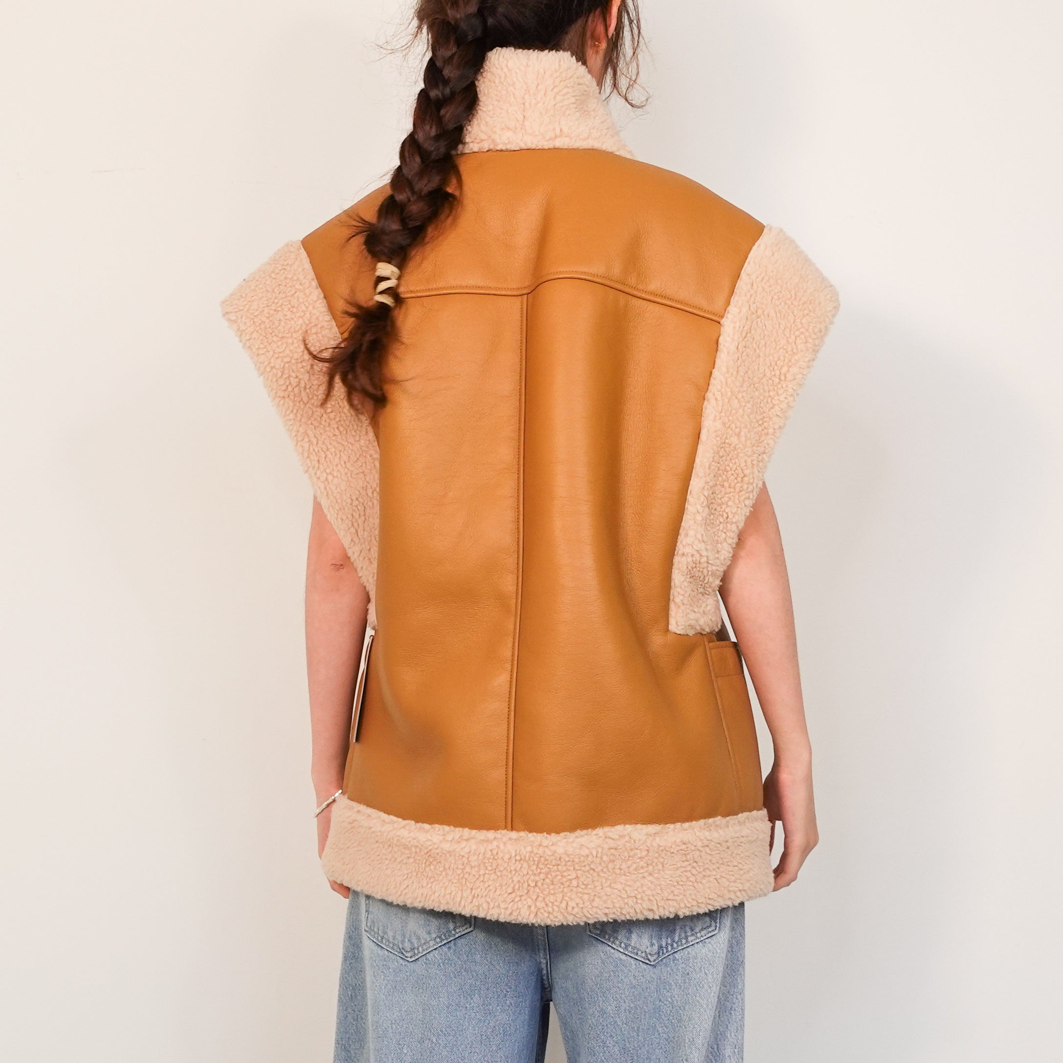 Sleeveless brown jacket