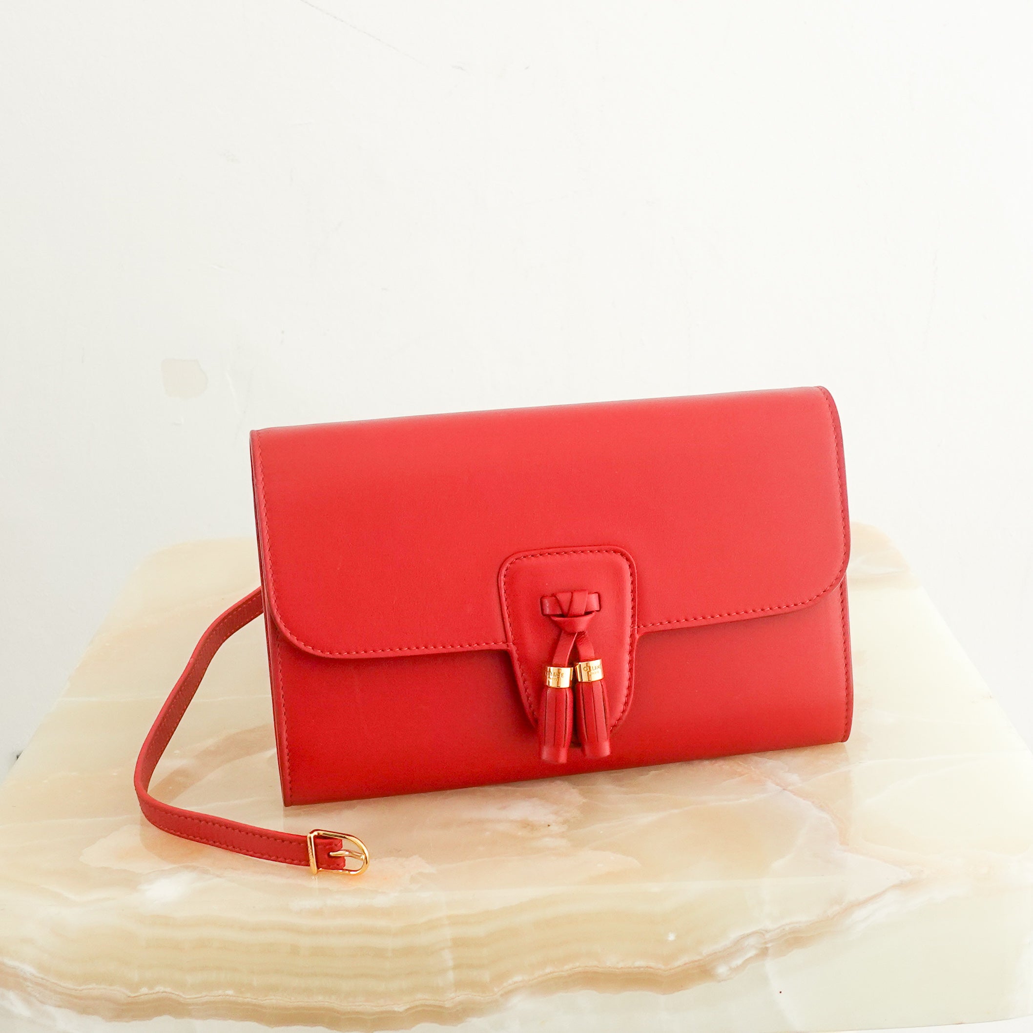 Red leather clutch RRP £620