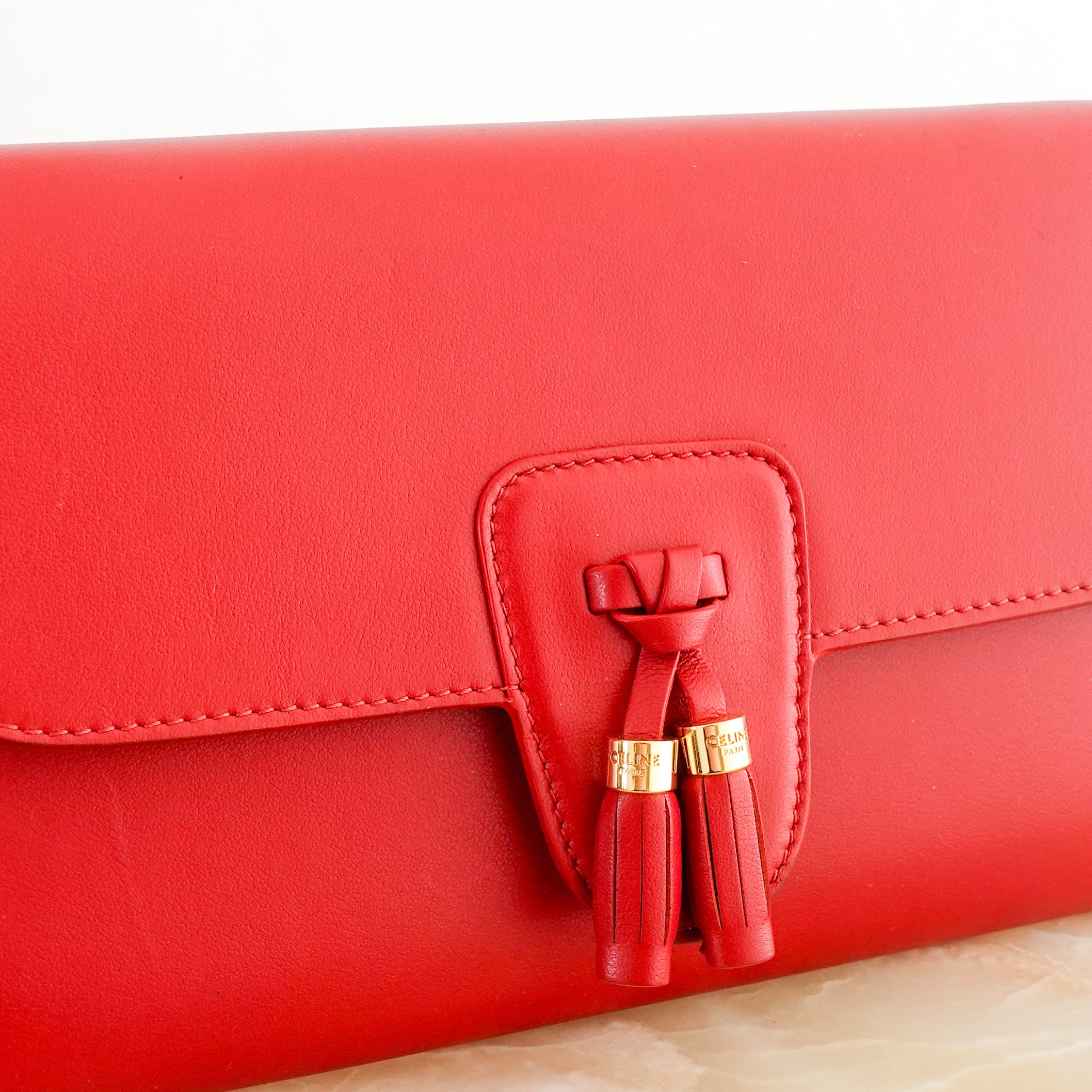 Red leather clutch RRP £620