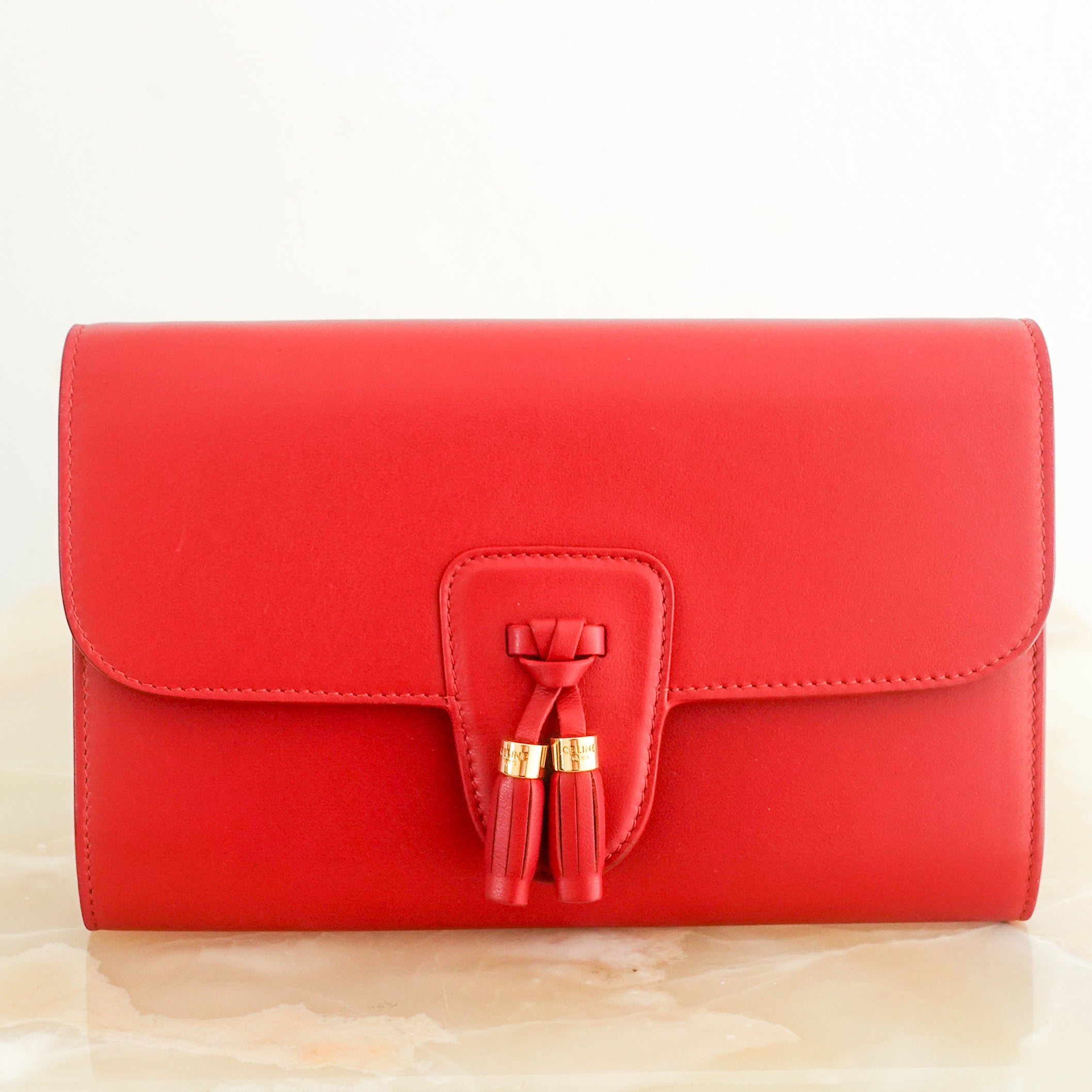 Red leather clutch RRP £620