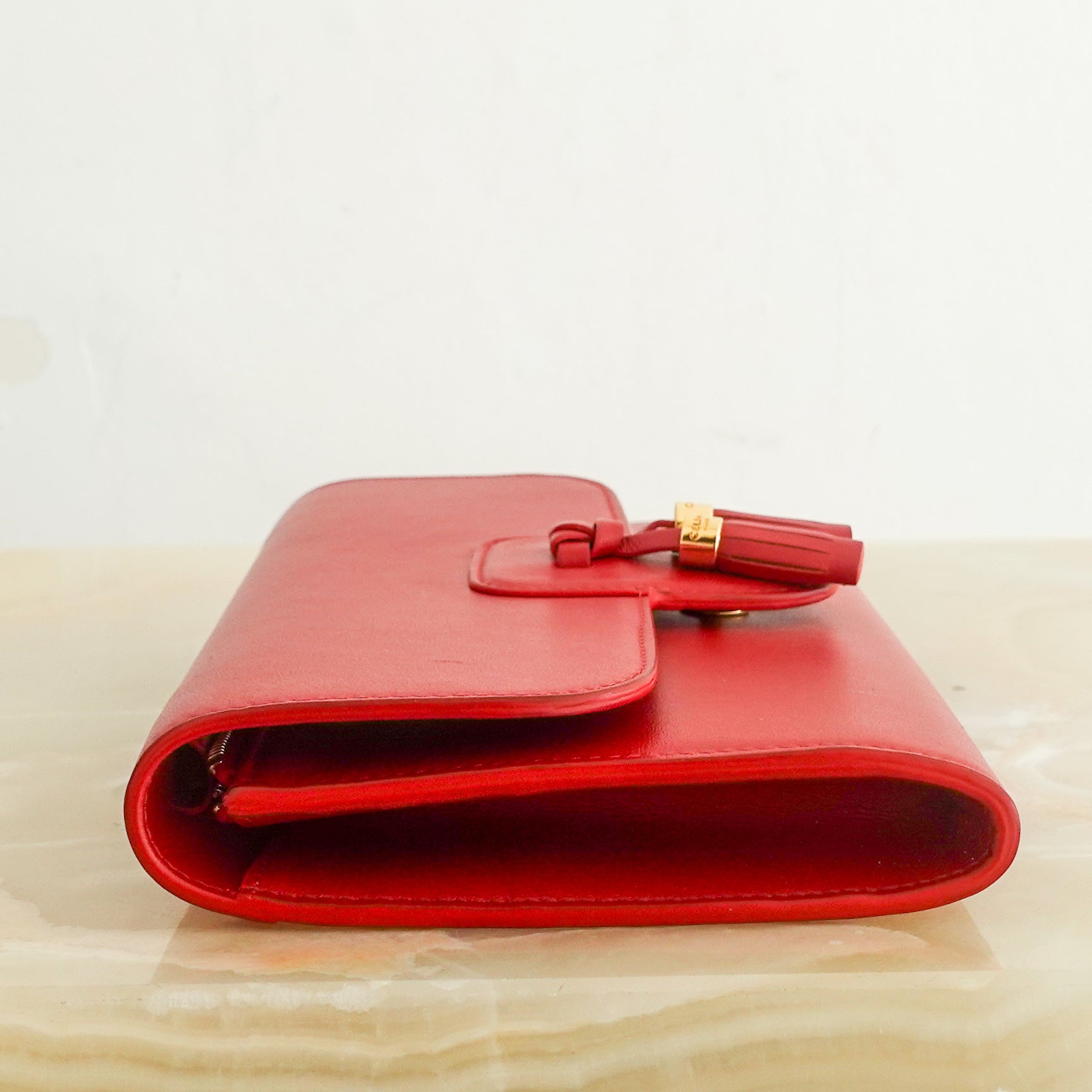 Red leather clutch RRP £620