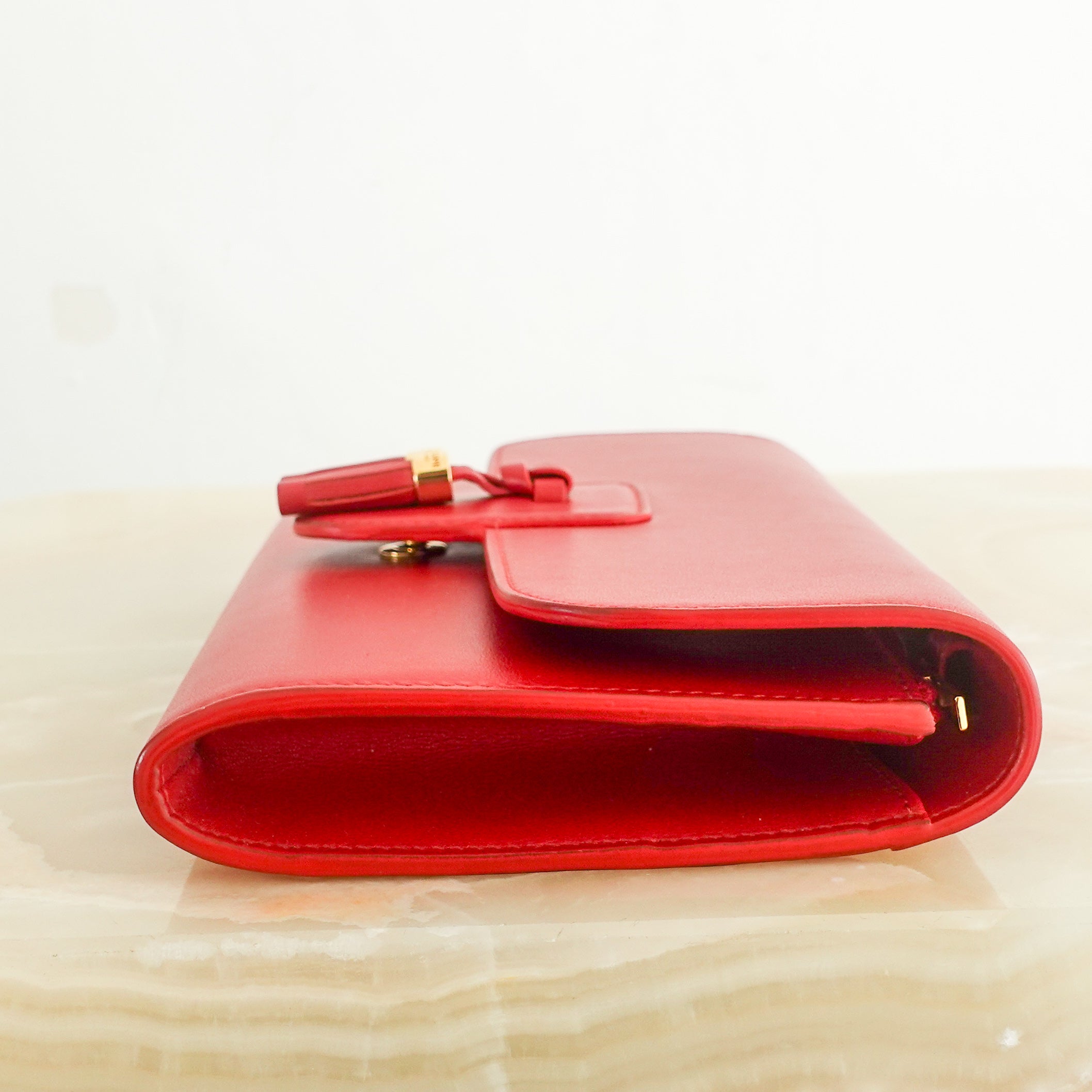 Red leather clutch RRP £620