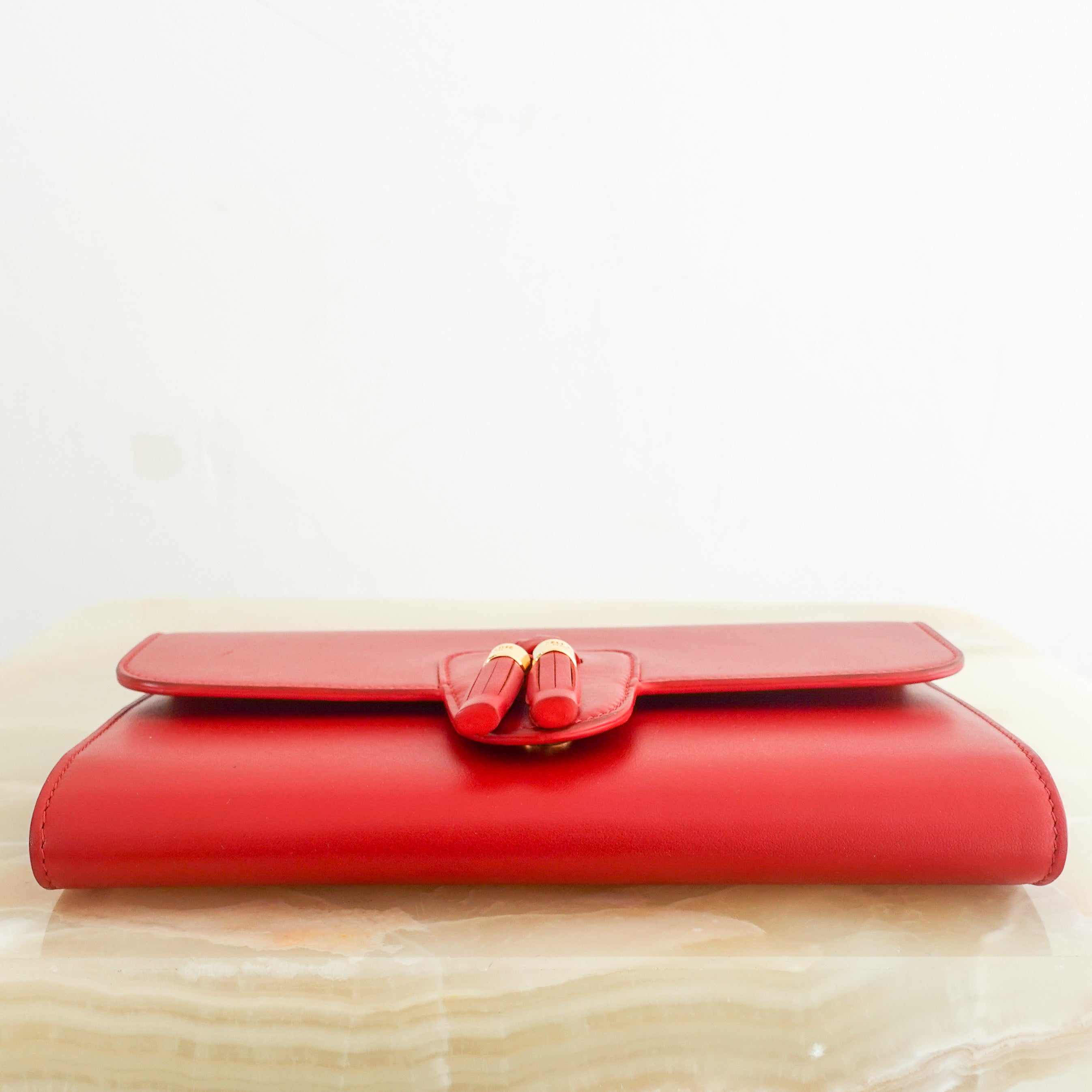 Red leather clutch RRP £620