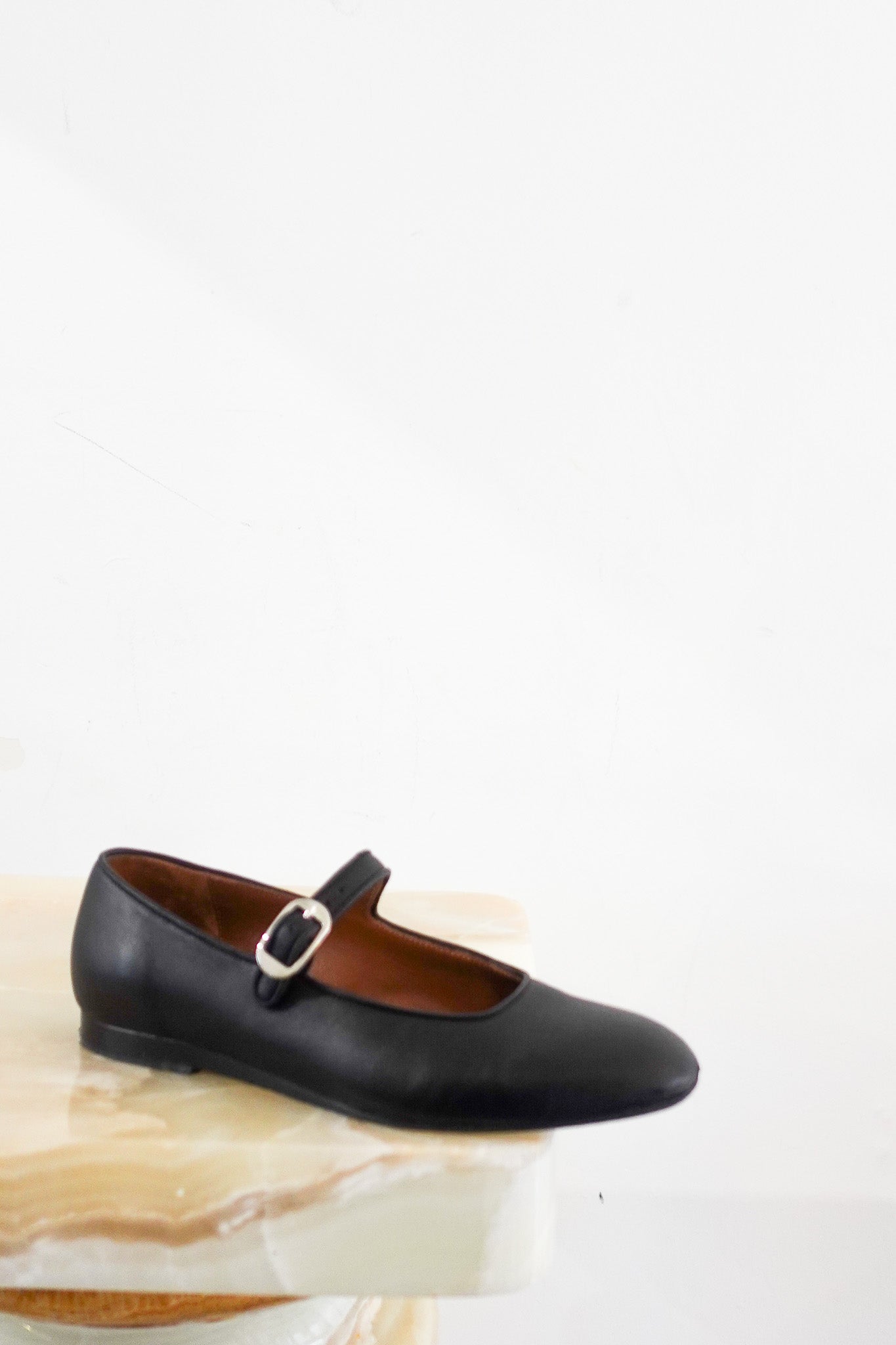 Black flat mary janes RRP £395