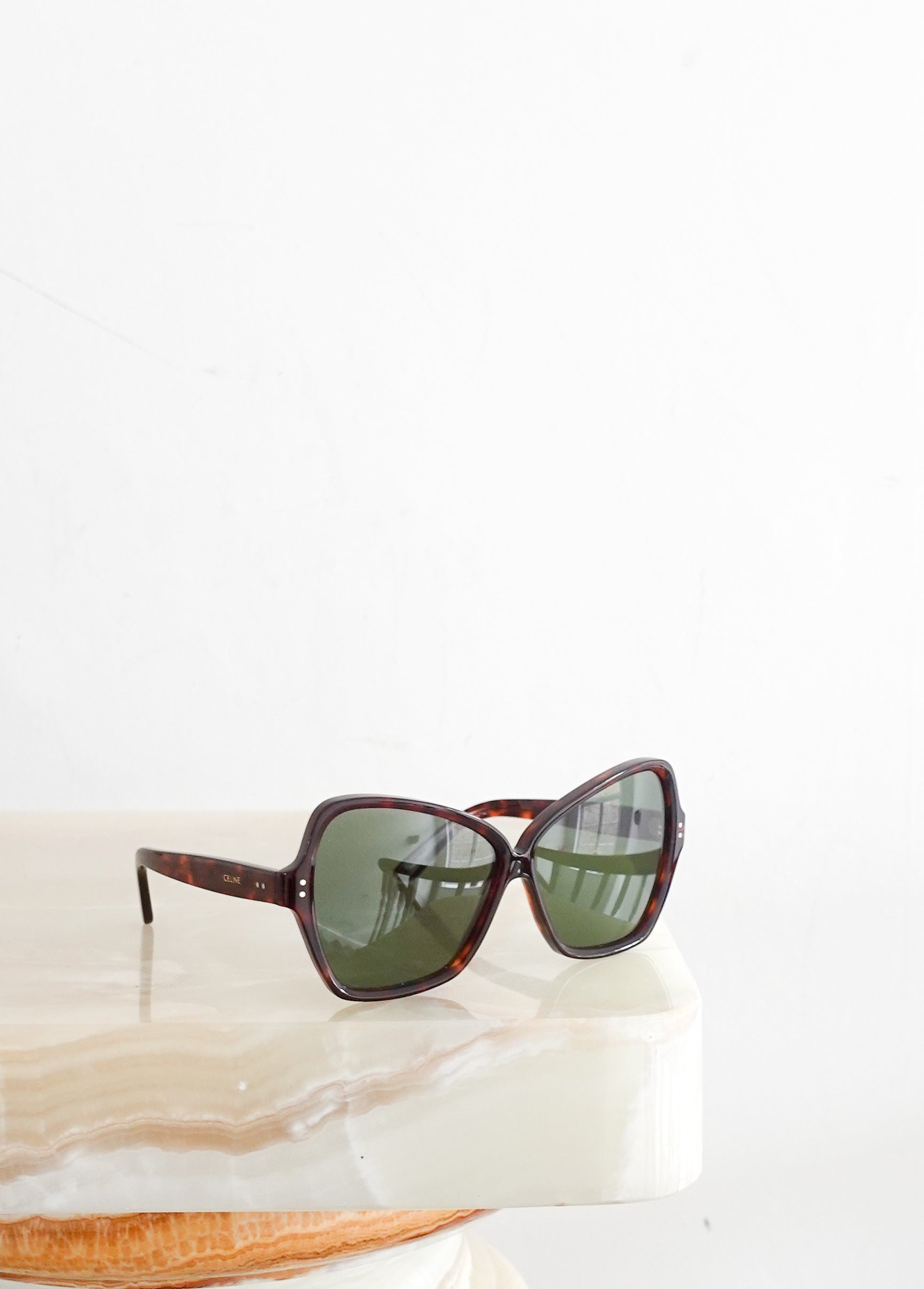 Green frame sunglasses RRP £380