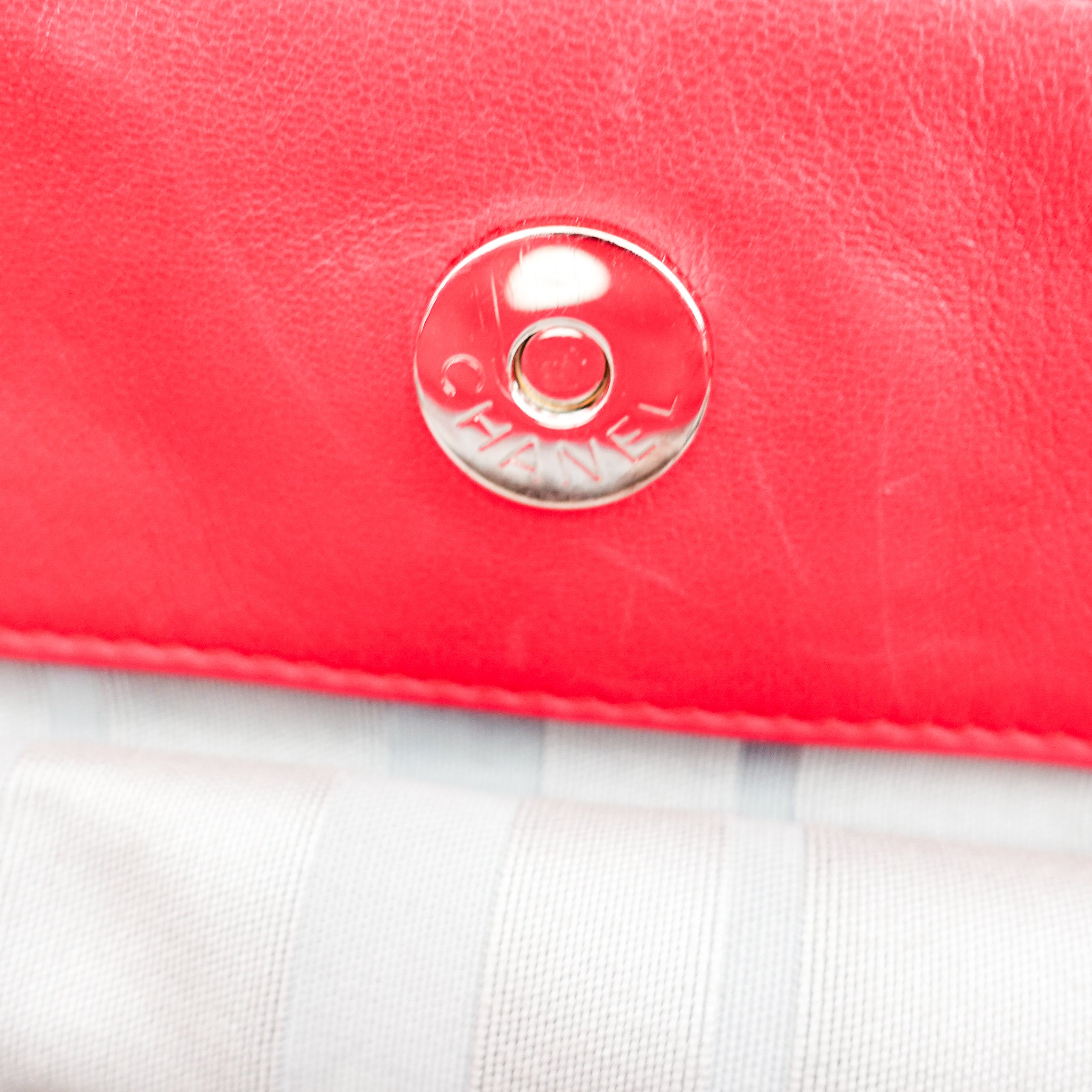 red leather disc bon bon bag