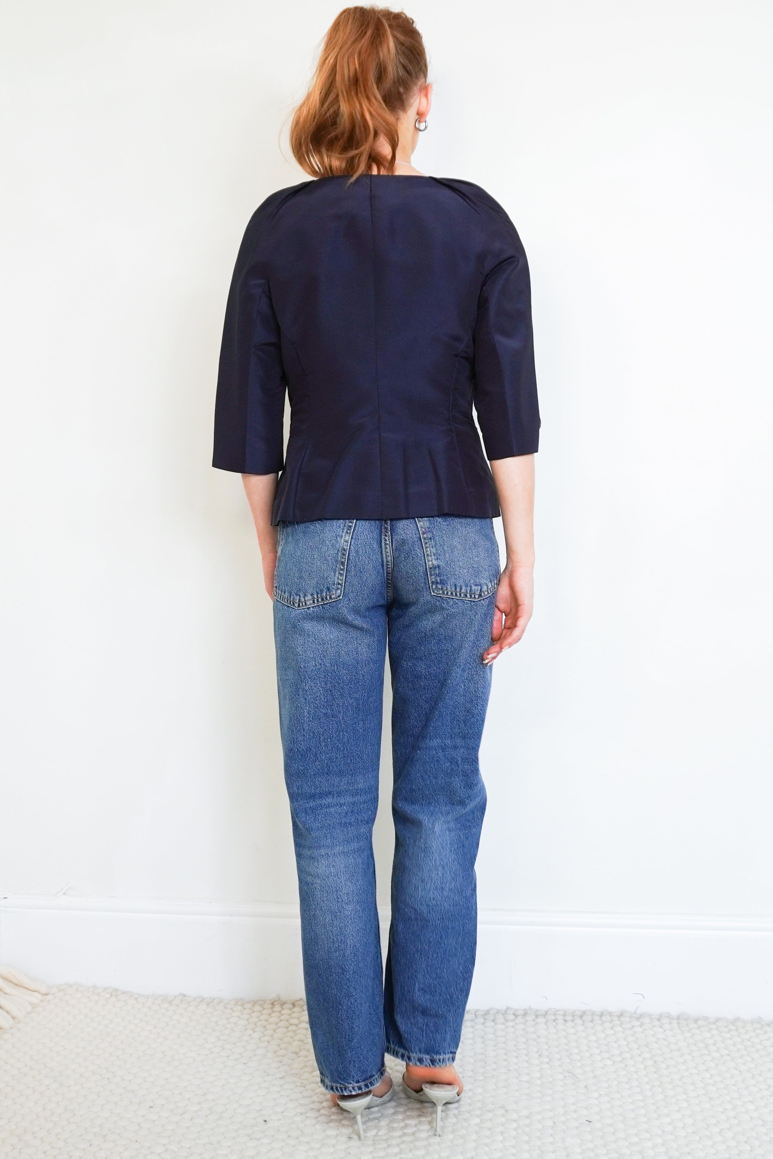 Back picture of the Oscar De La Renta Top showing the tailoring details.