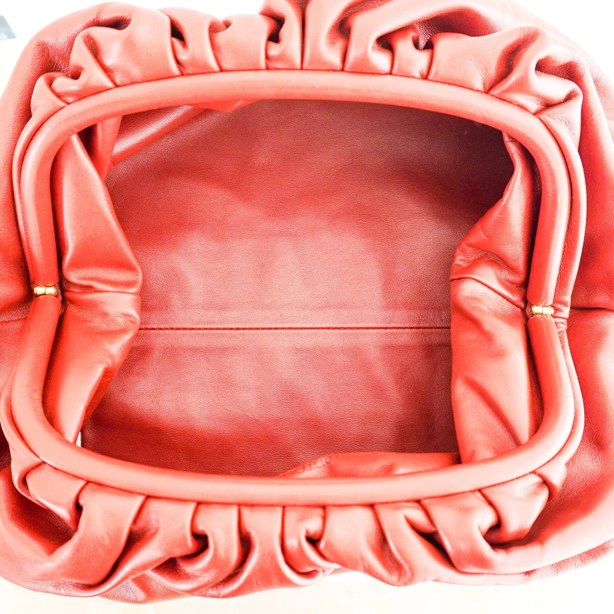 Bottega Oversized Cloud Clutch Rust (RRP £2600) | Authentic Preloved - Reloved Again