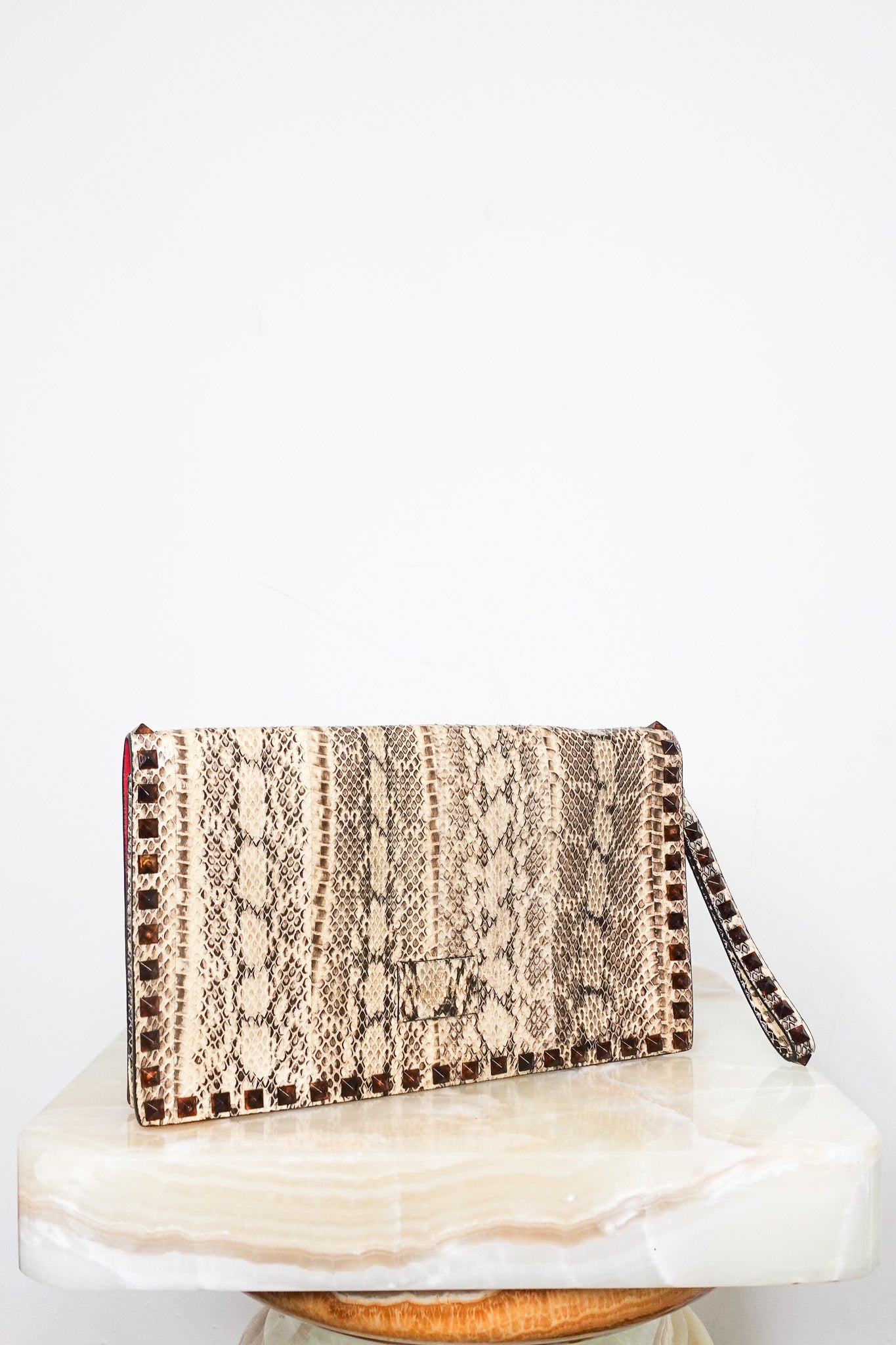 Beige python clutch RRP £600