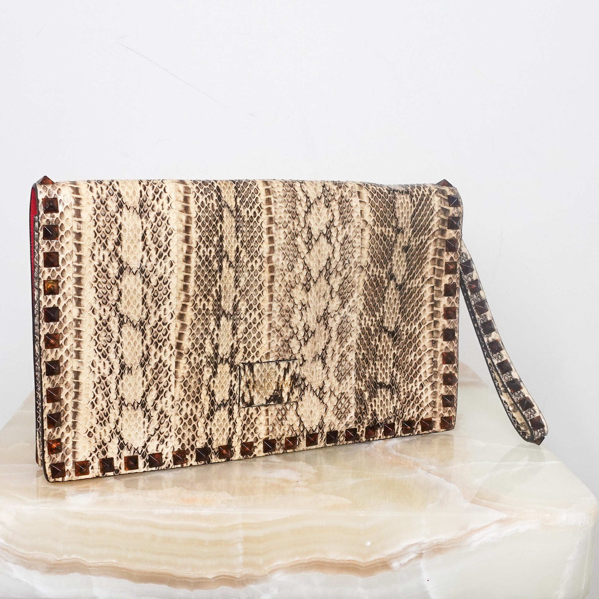 Beige python clutch RRP £600