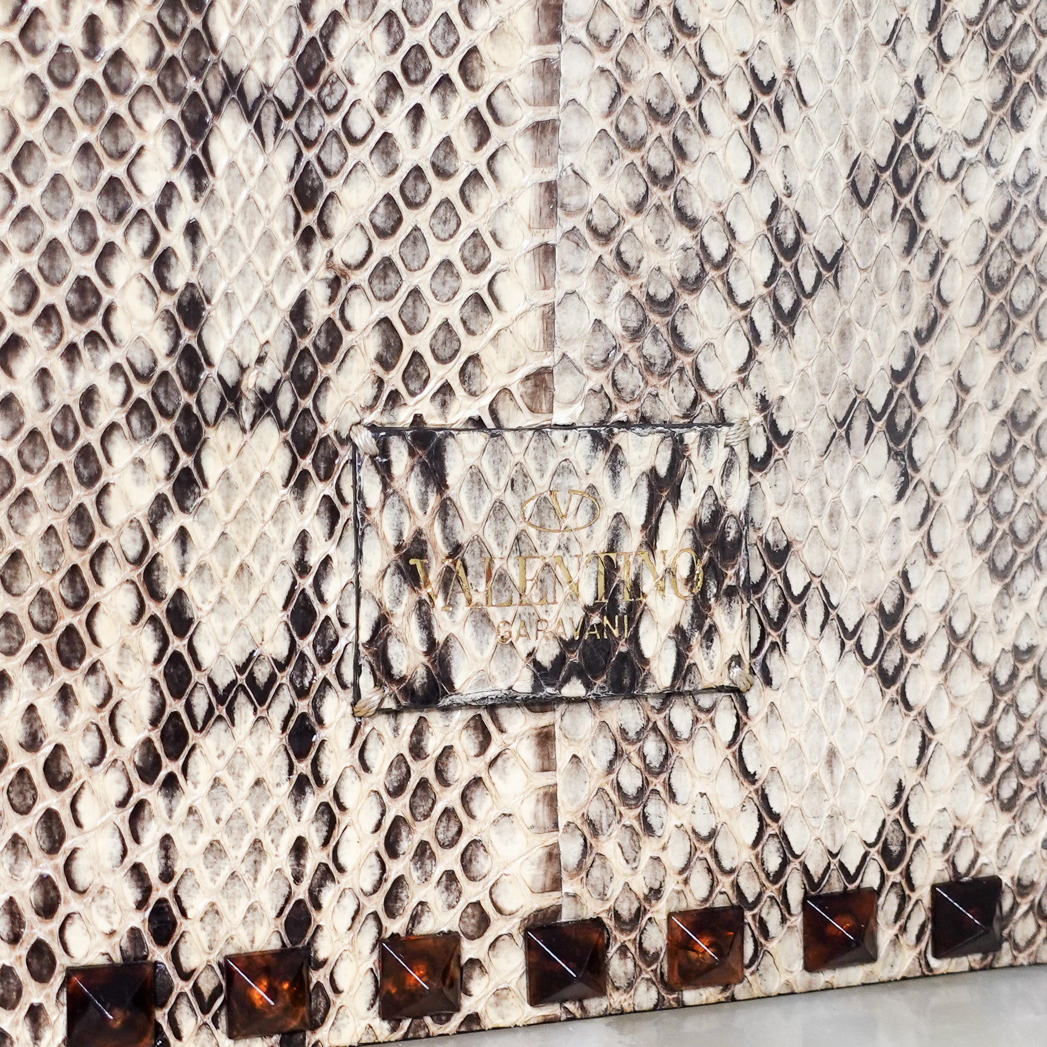 Beige python clutch RRP £600