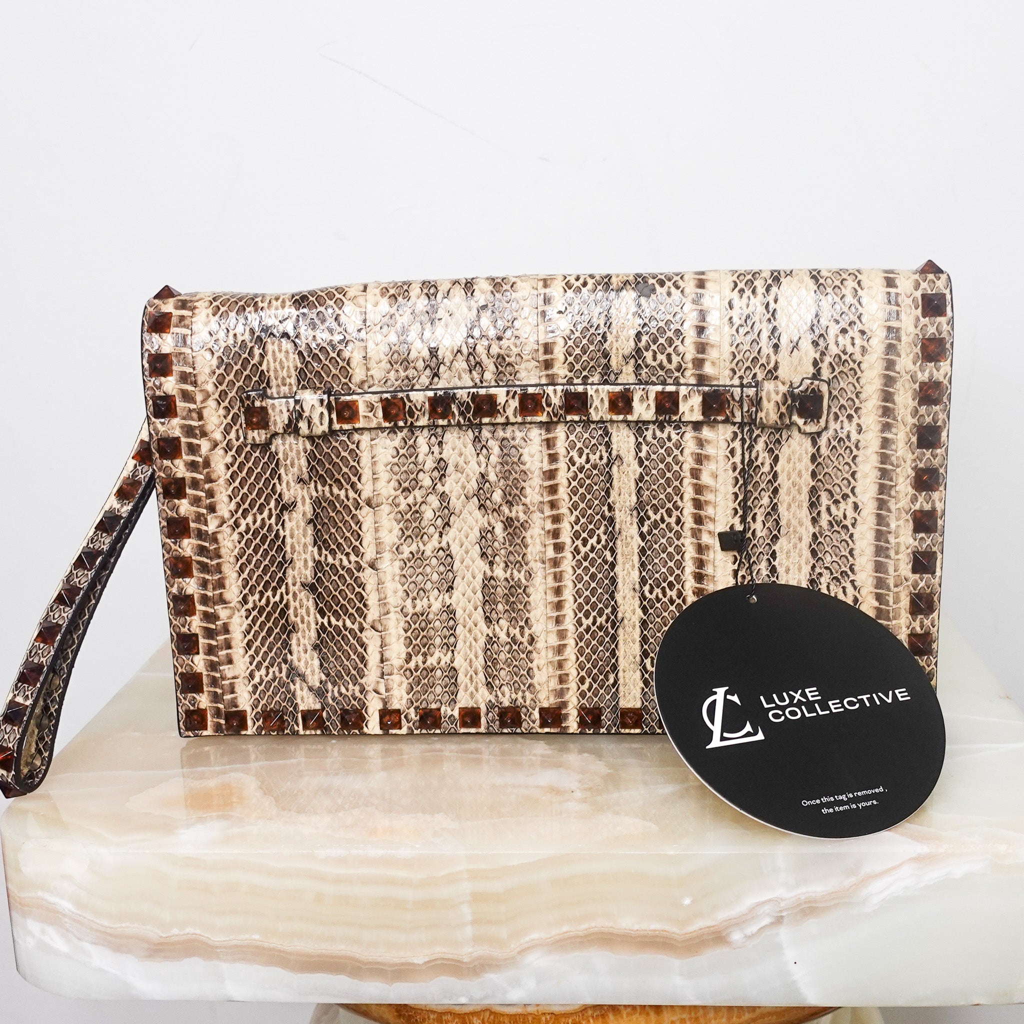 Beige python clutch RRP £600