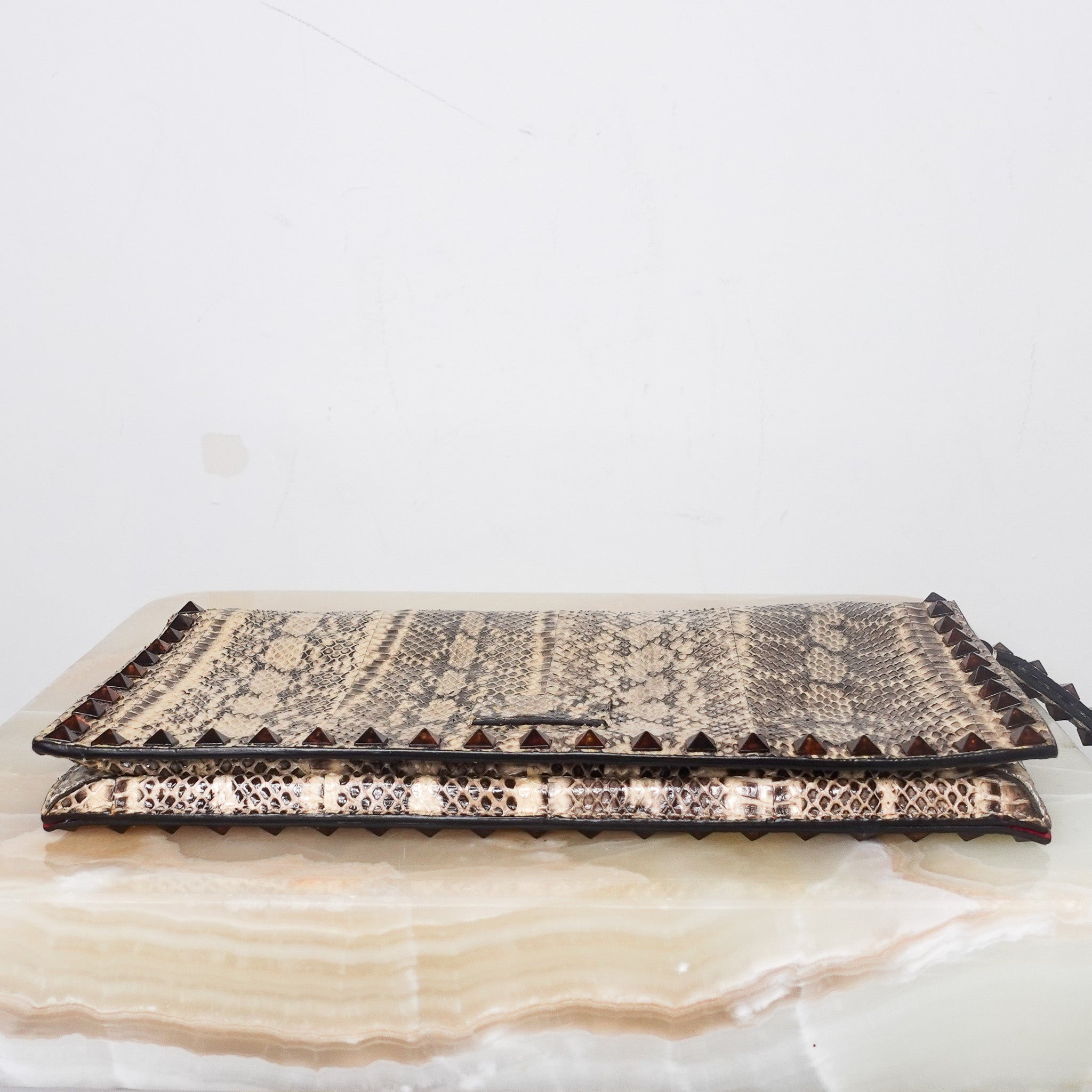 Beige python clutch RRP £600