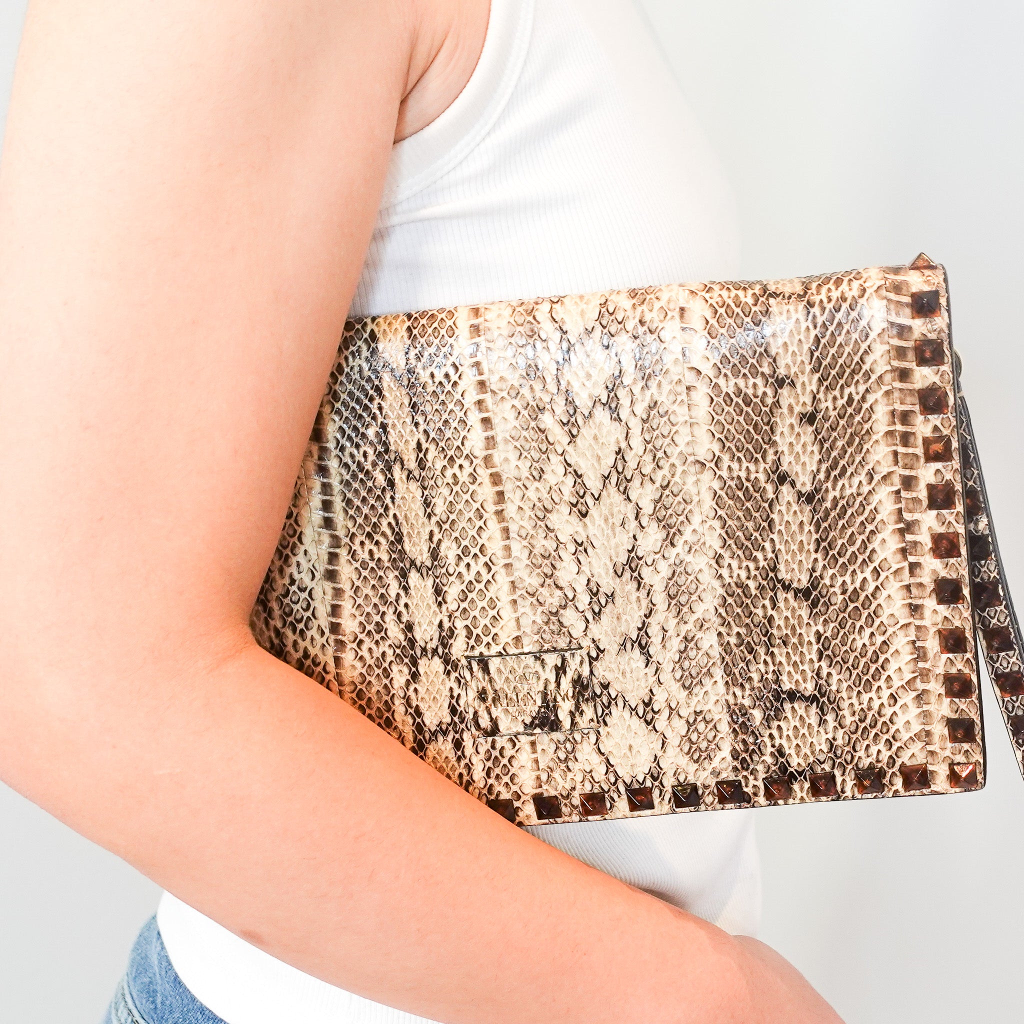 Beige python clutch RRP £600