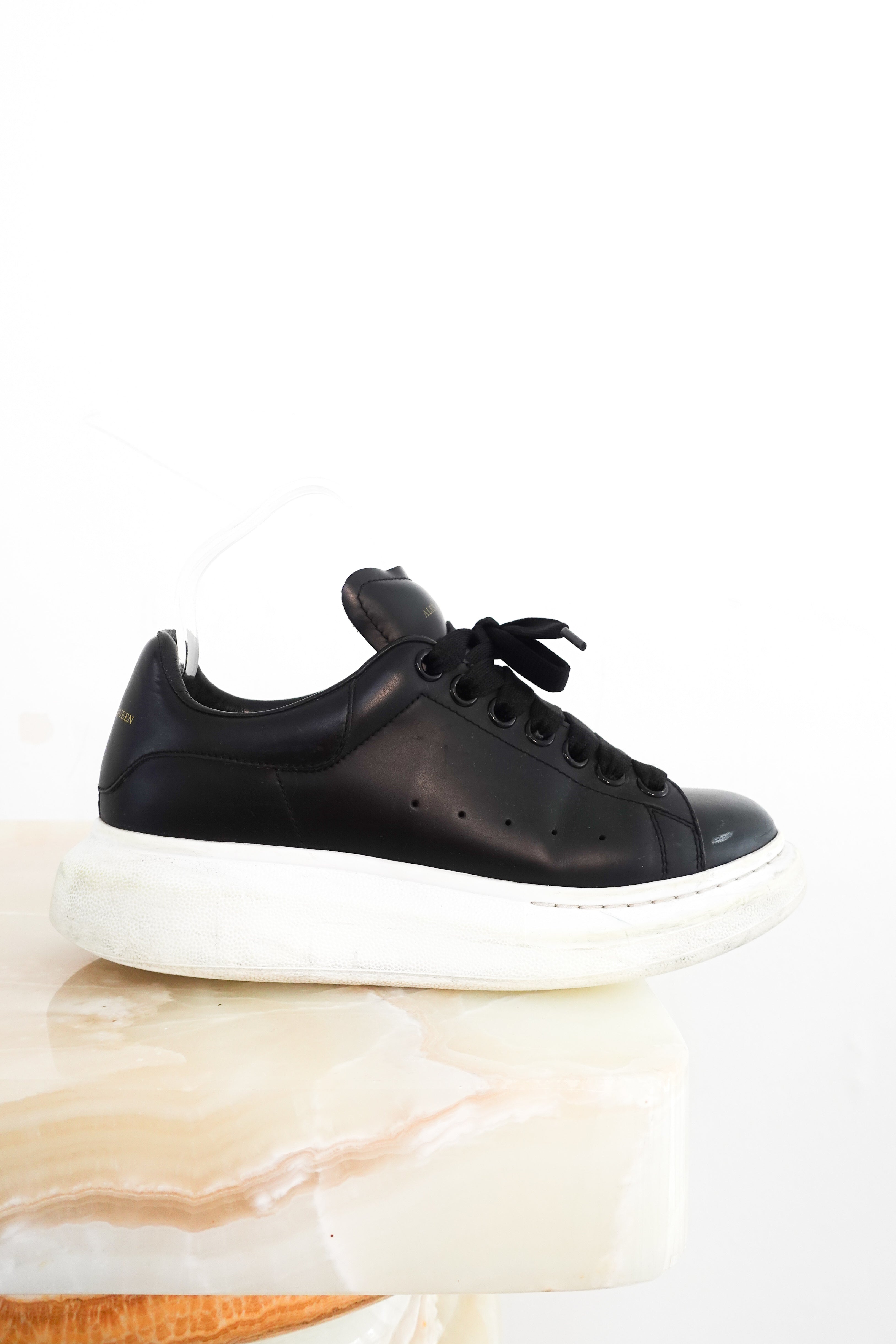 Leather exaggerated-sole sneakers RRP £460