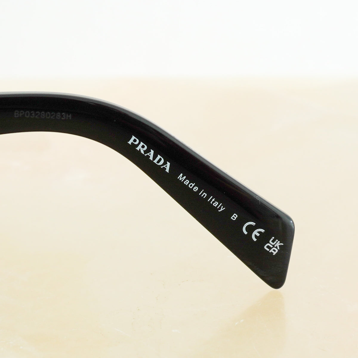 Prada Symbole Sunglasses in Black (RRP £310) | Authentic Preloved - Reloved Again