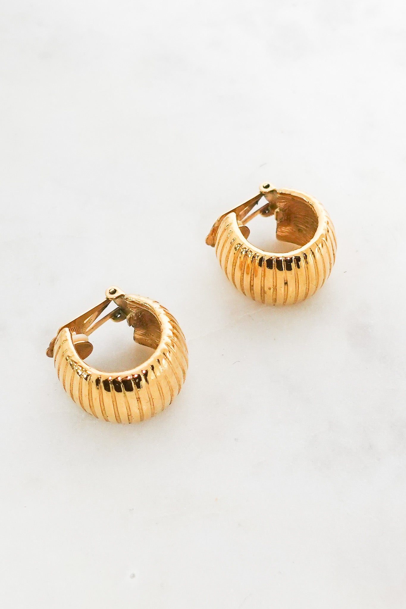 Gold tone clip on earrings