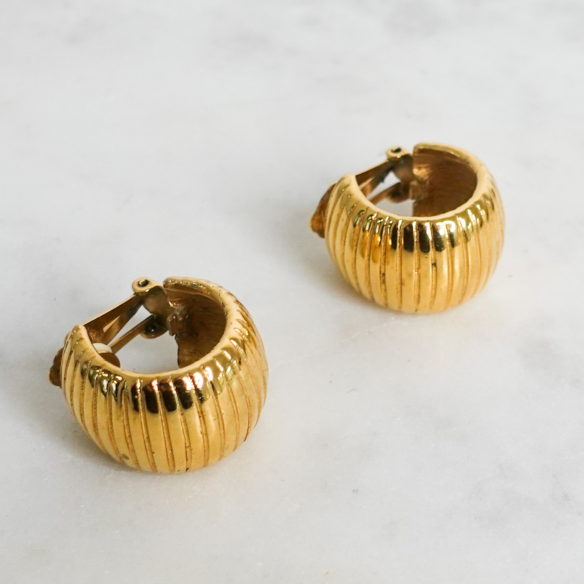 Gold tone clip on earrings