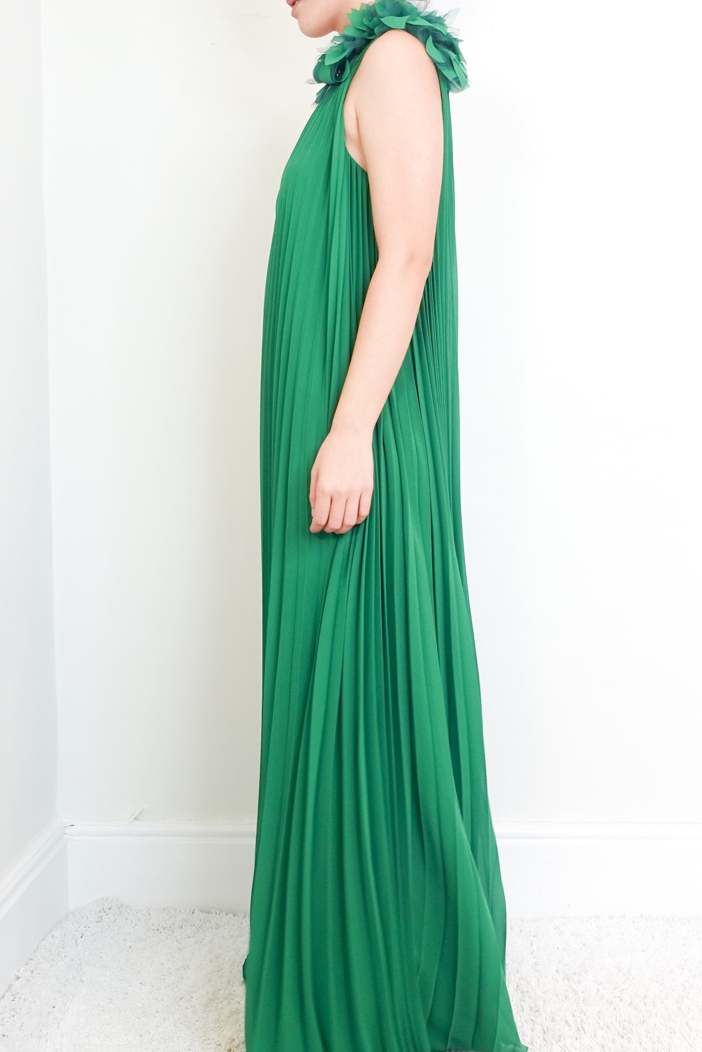 Green one-shoulder pleated gown