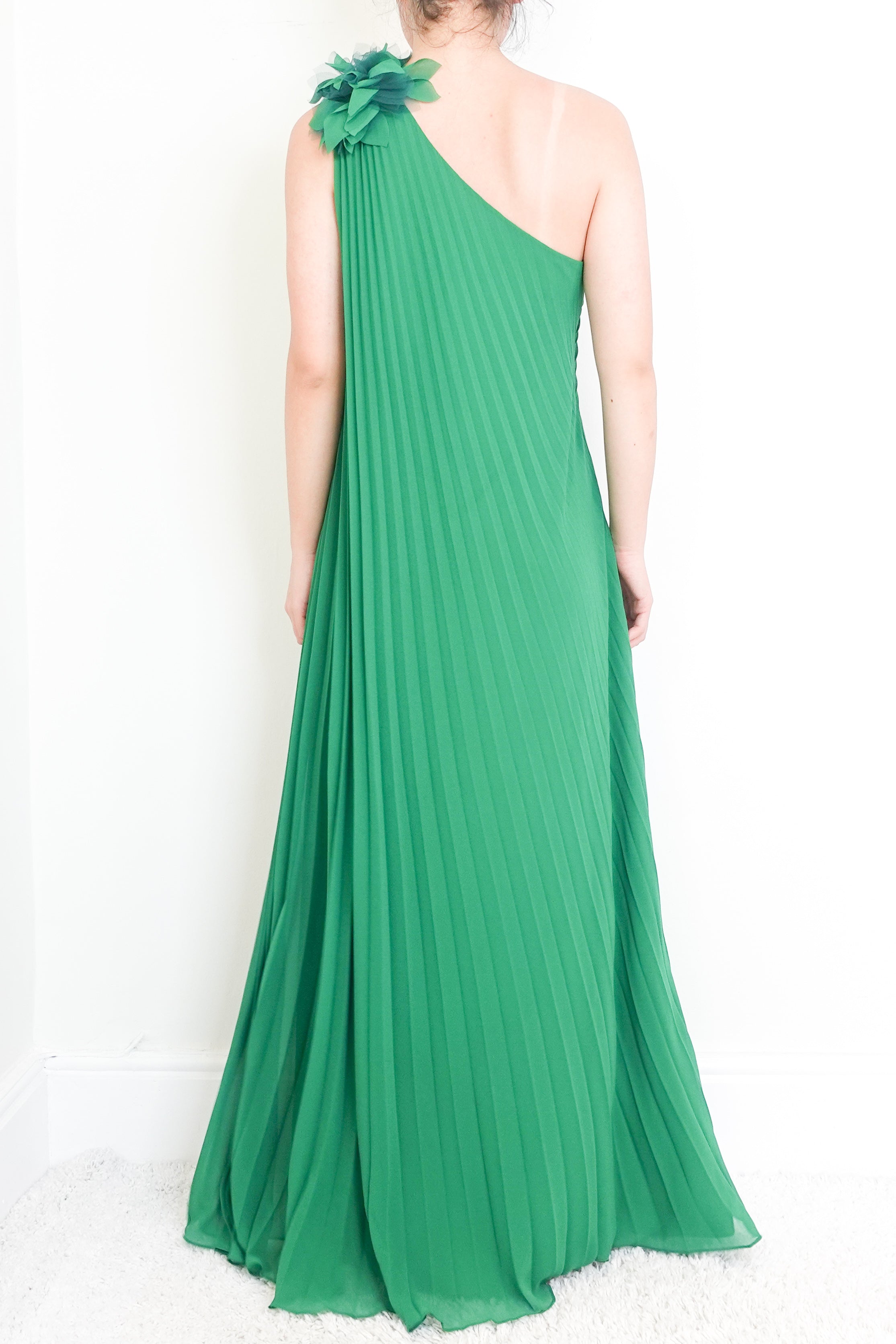 Green one-shoulder pleated gown