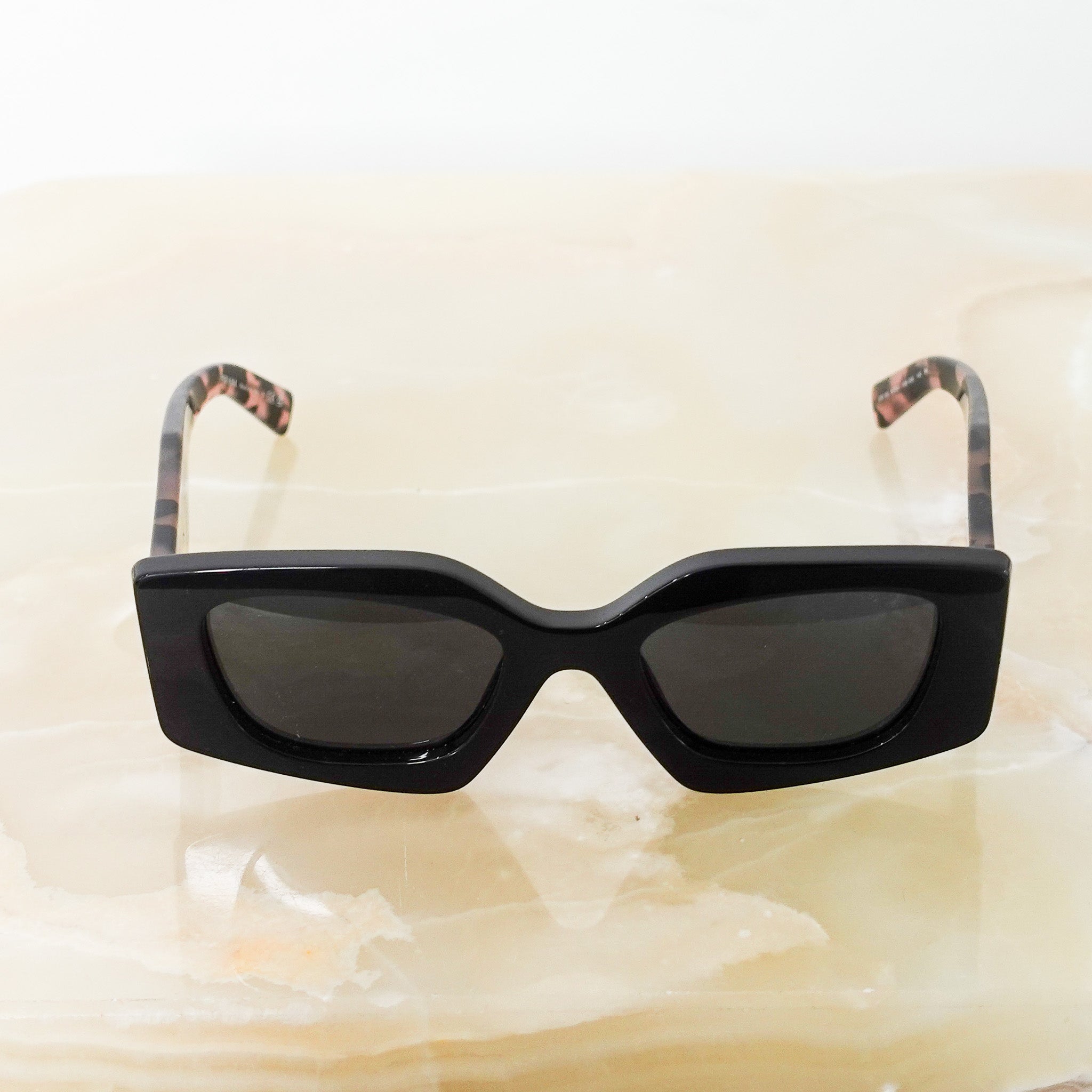 Black tinted sunglasses RRP £350