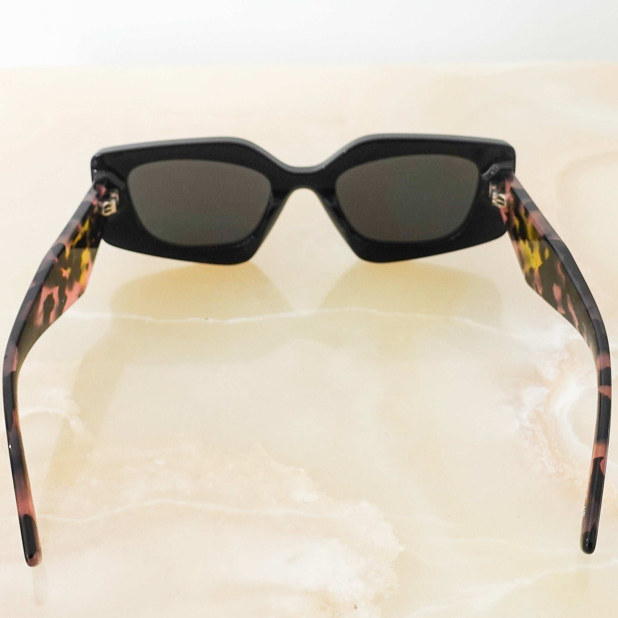 Black tinted sunglasses RRP £350