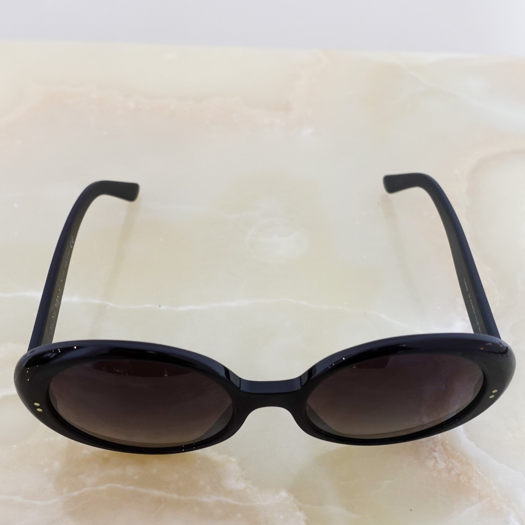 Oval black sunglasses RRP £350