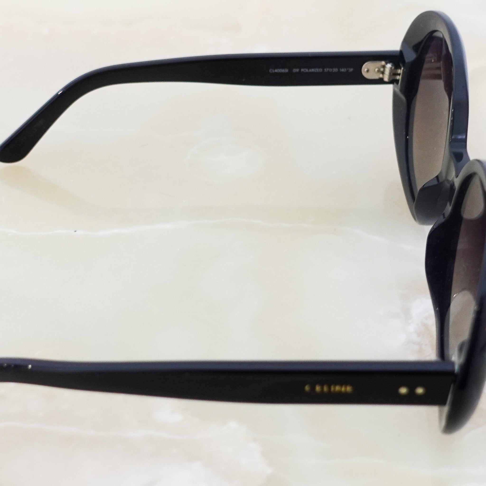 Oval black sunglasses RRP £350