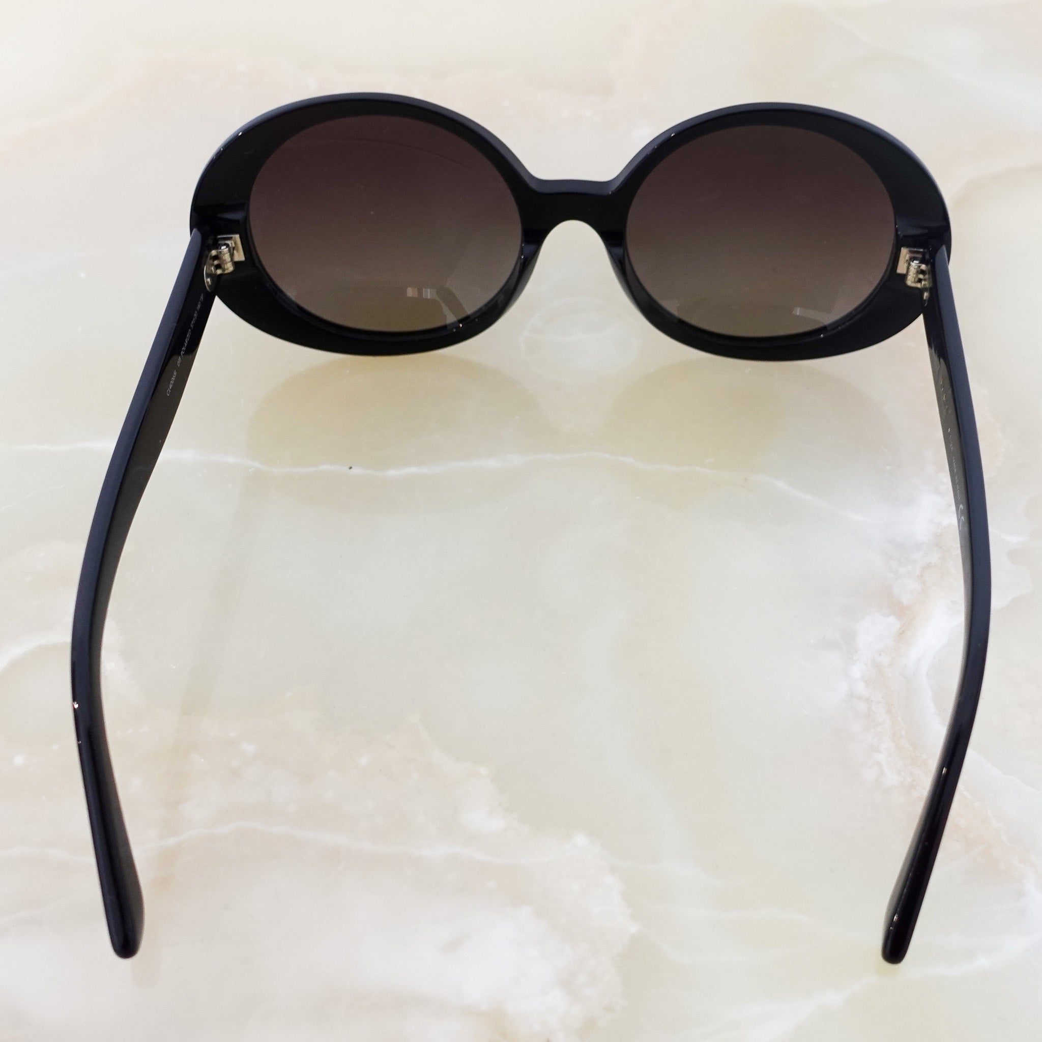 Oval black sunglasses RRP £350