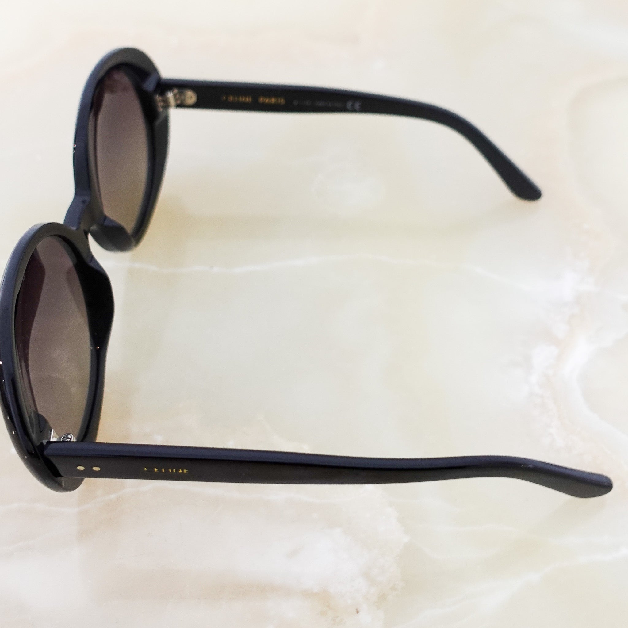 Oval black sunglasses RRP £350