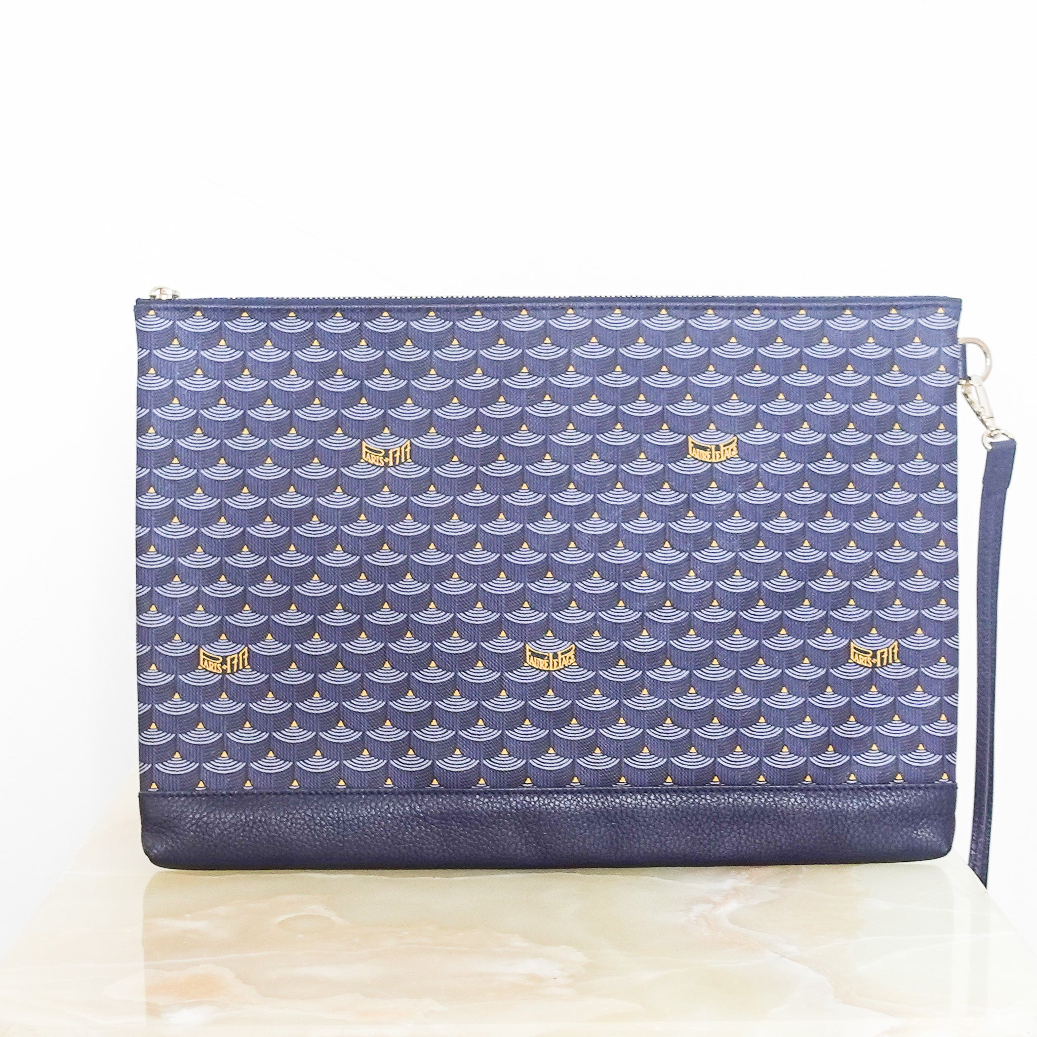 Blue leather clutch RRP £560