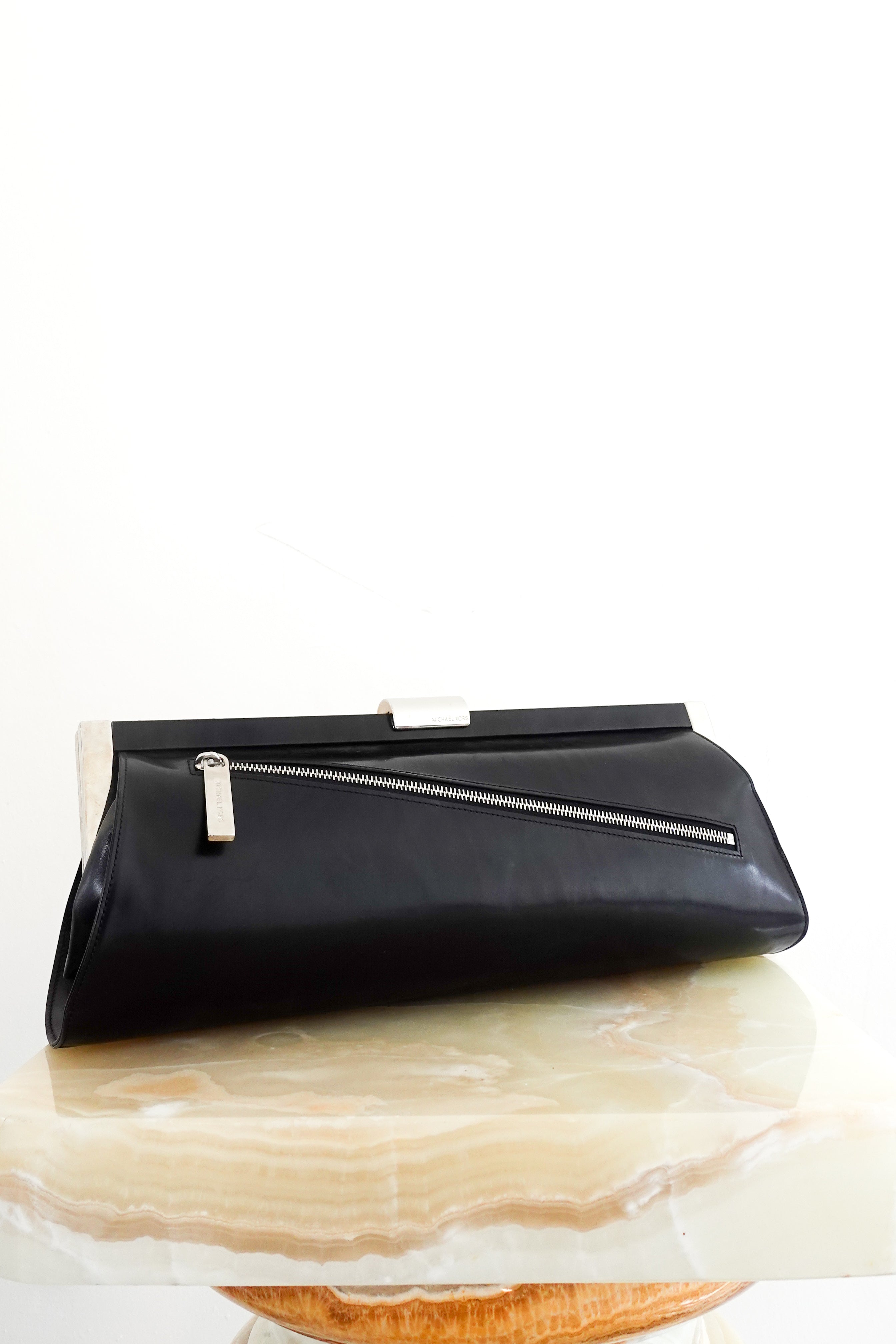 Long cylindrical clutch with silver hardware RRP £875