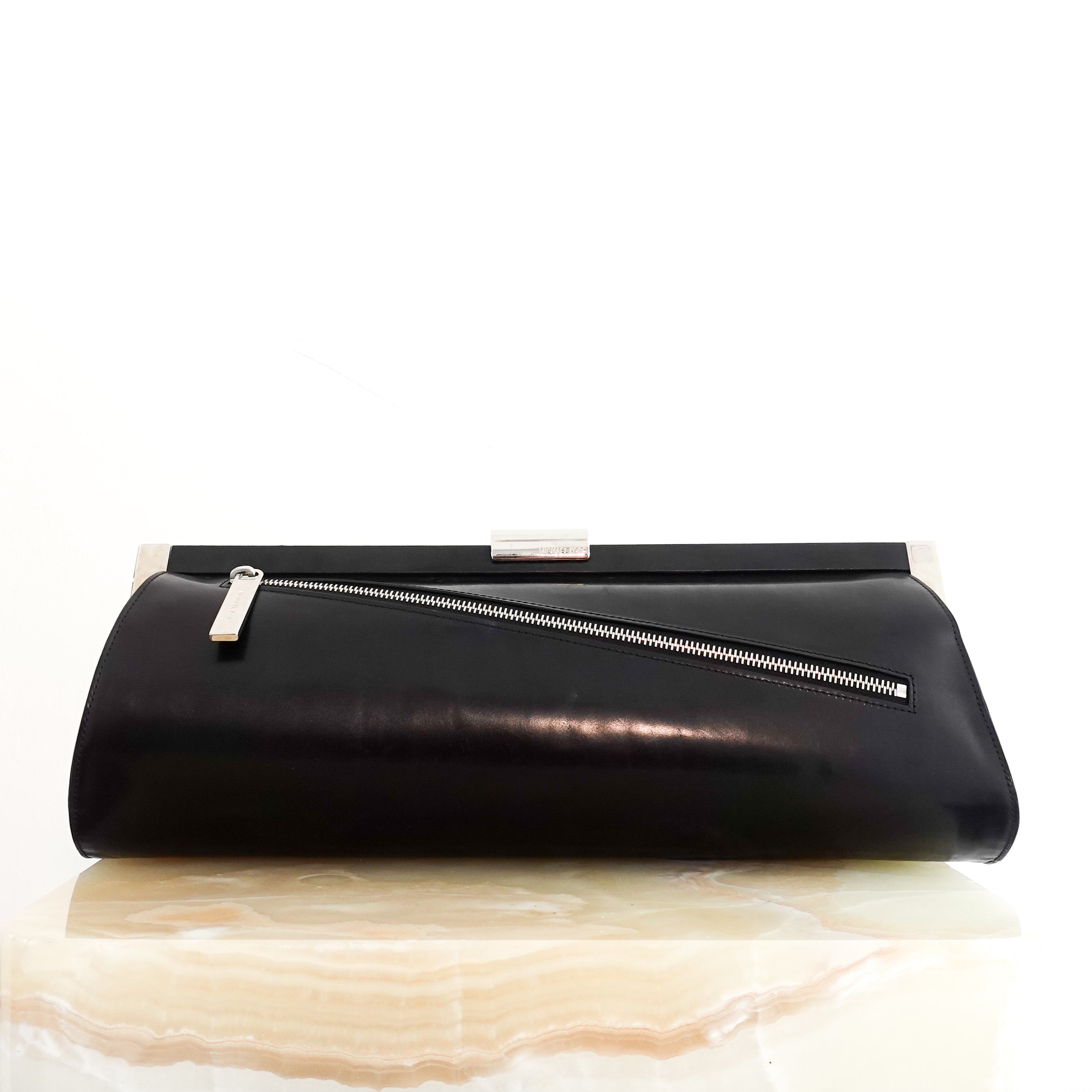 Long cylindrical clutch with silver hardware RRP £875