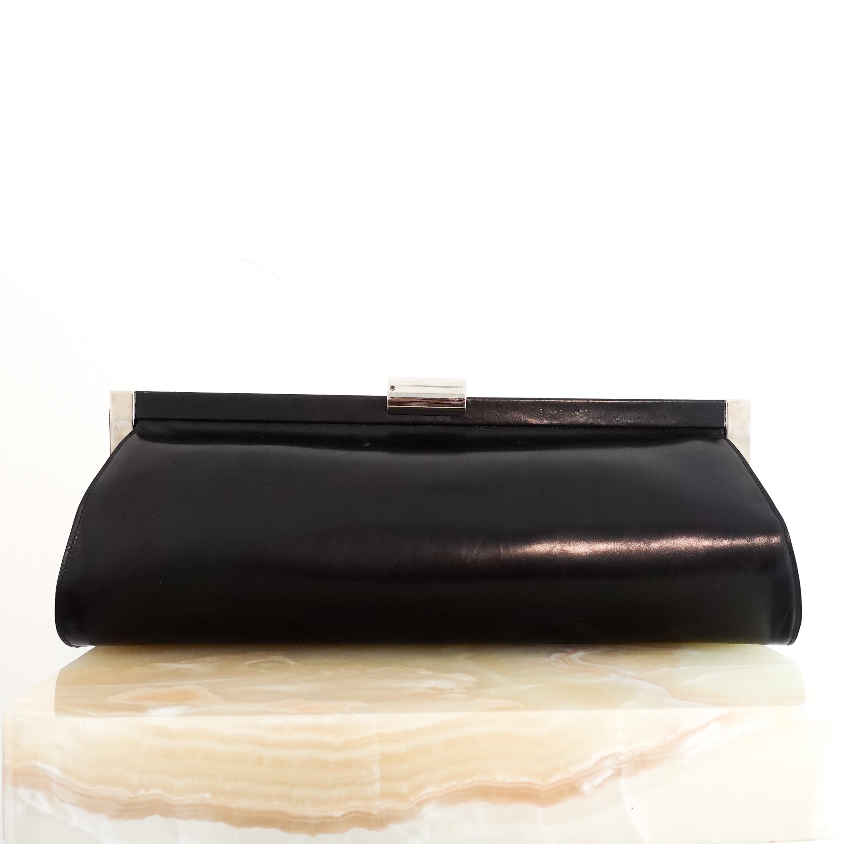 Long cylindrical clutch with silver hardware RRP £875