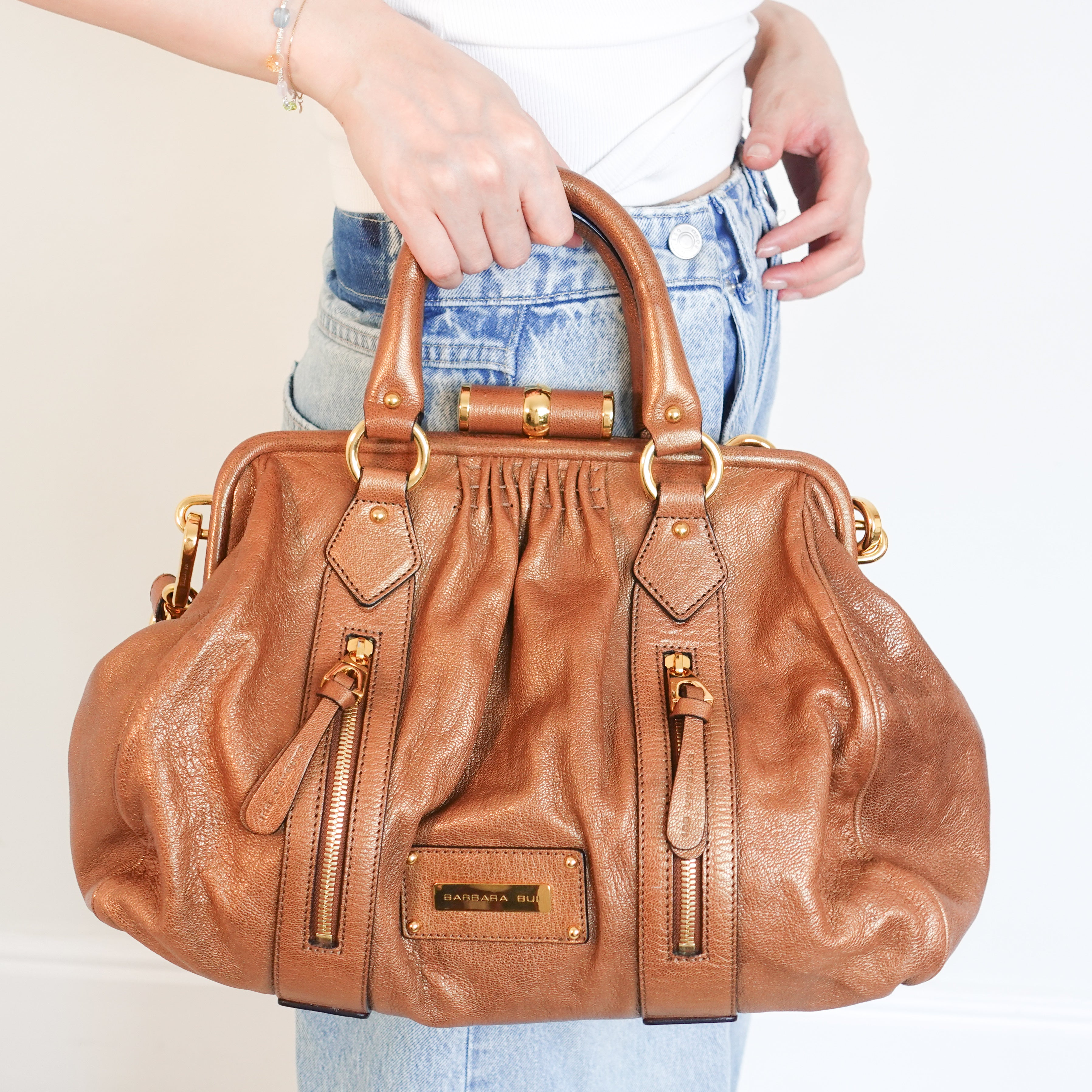 Brown metallic handbag