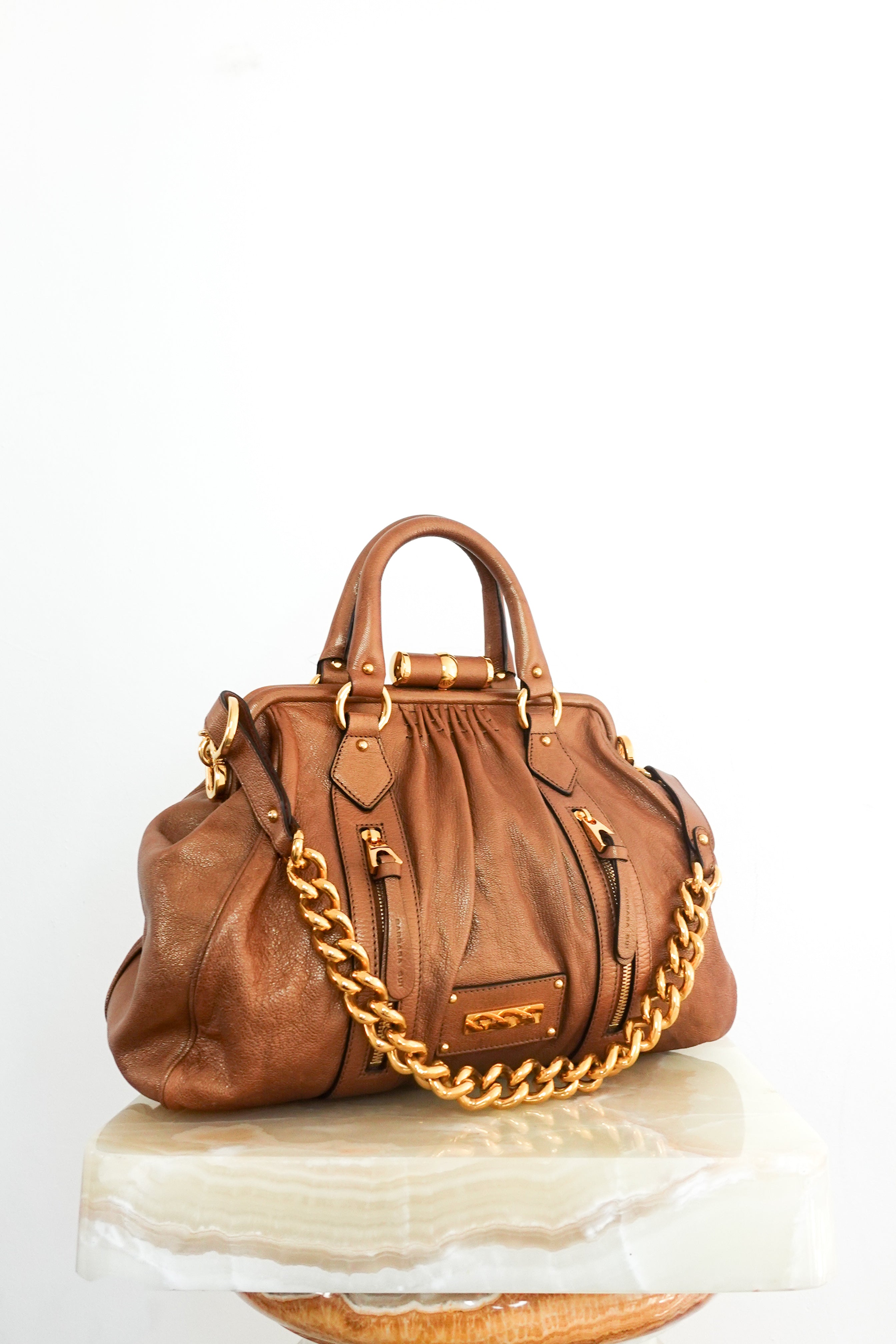 Brown metallic handbag