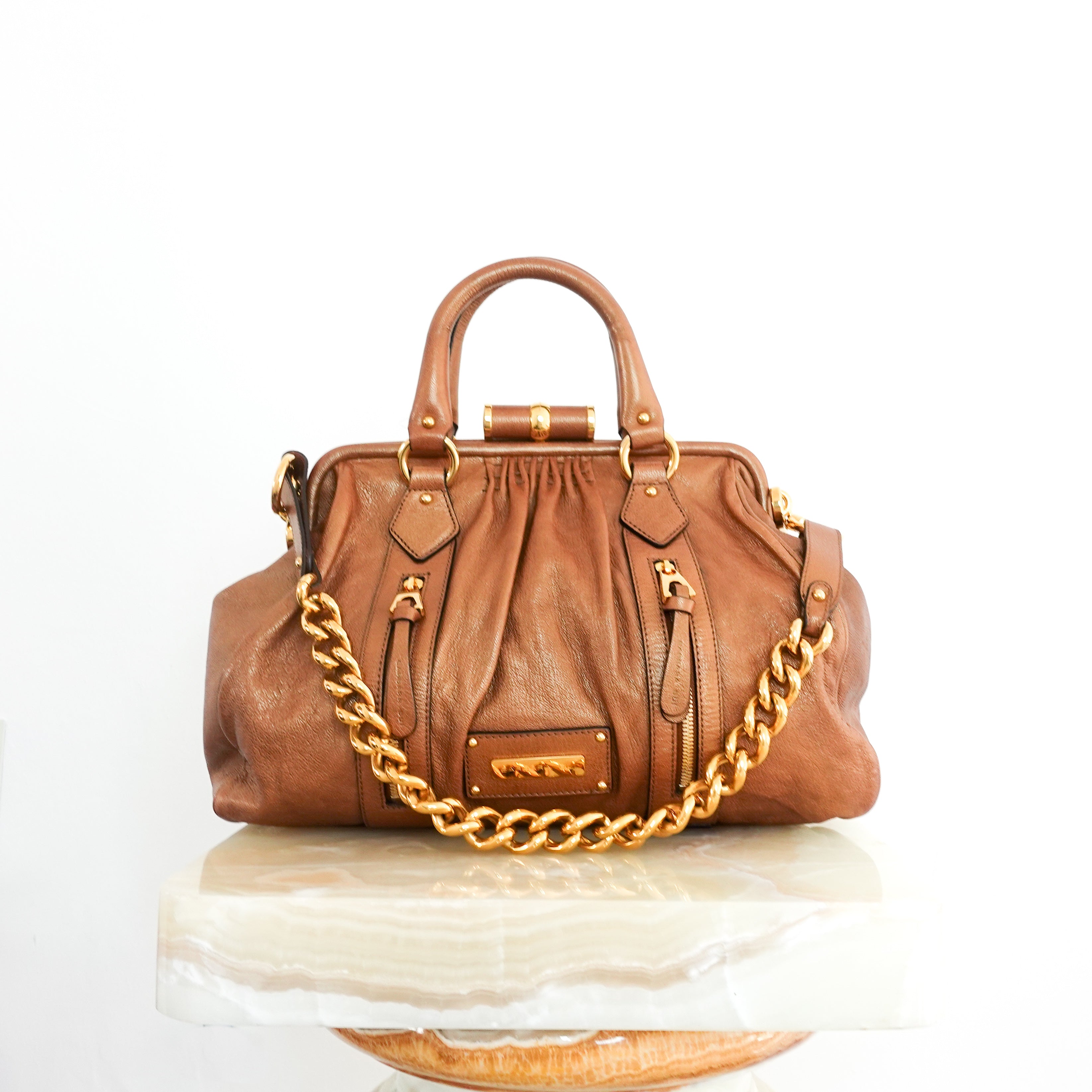 Brown metallic handbag