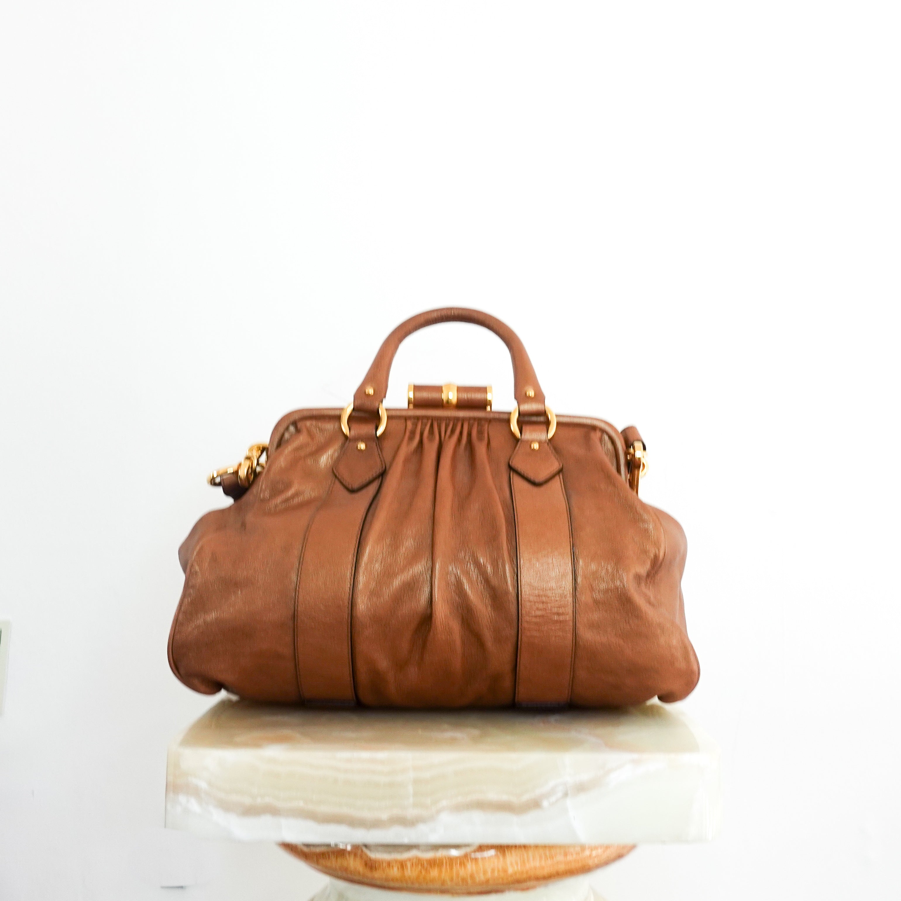 Brown metallic handbag