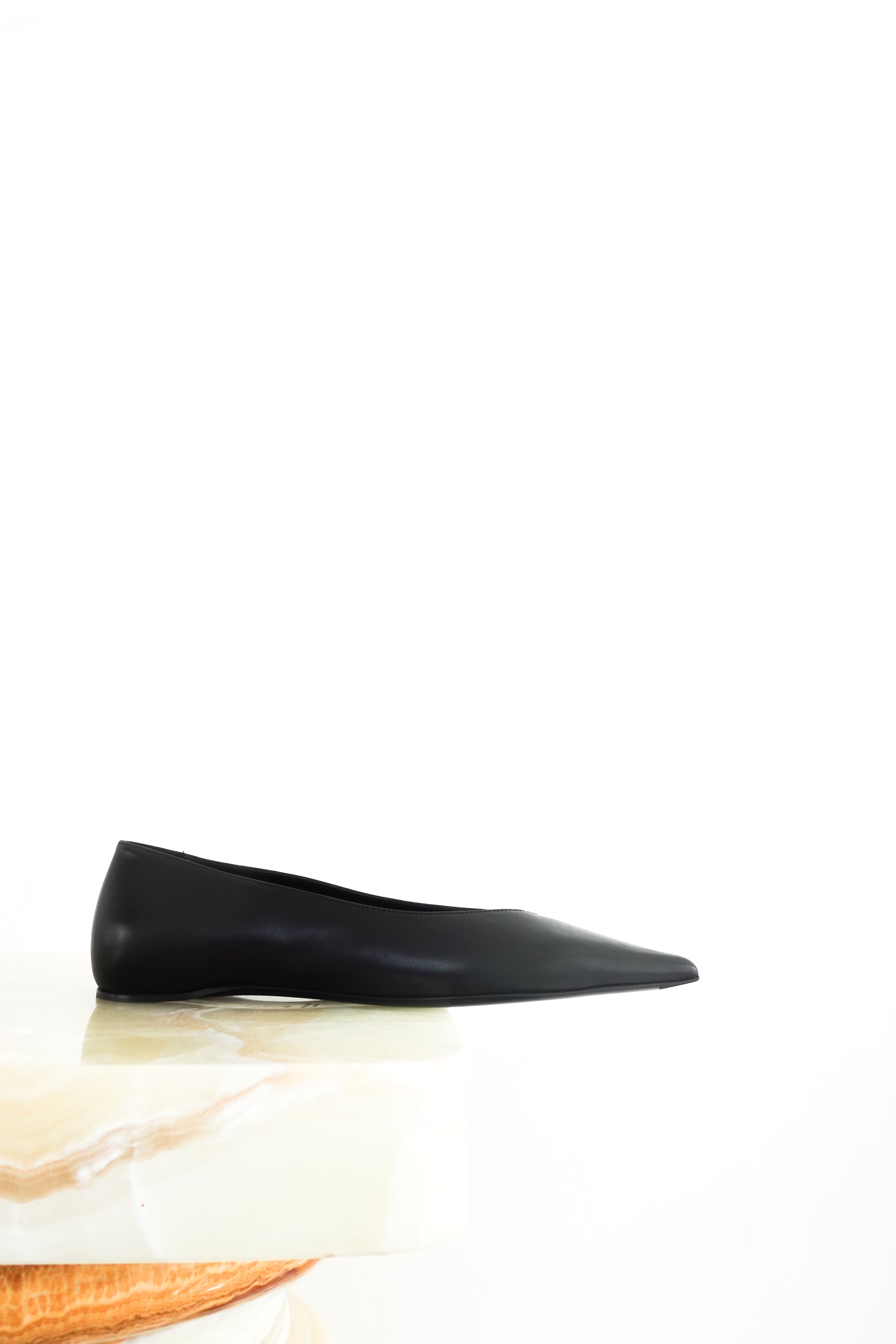 Asymmetric ballet flats RRP £450