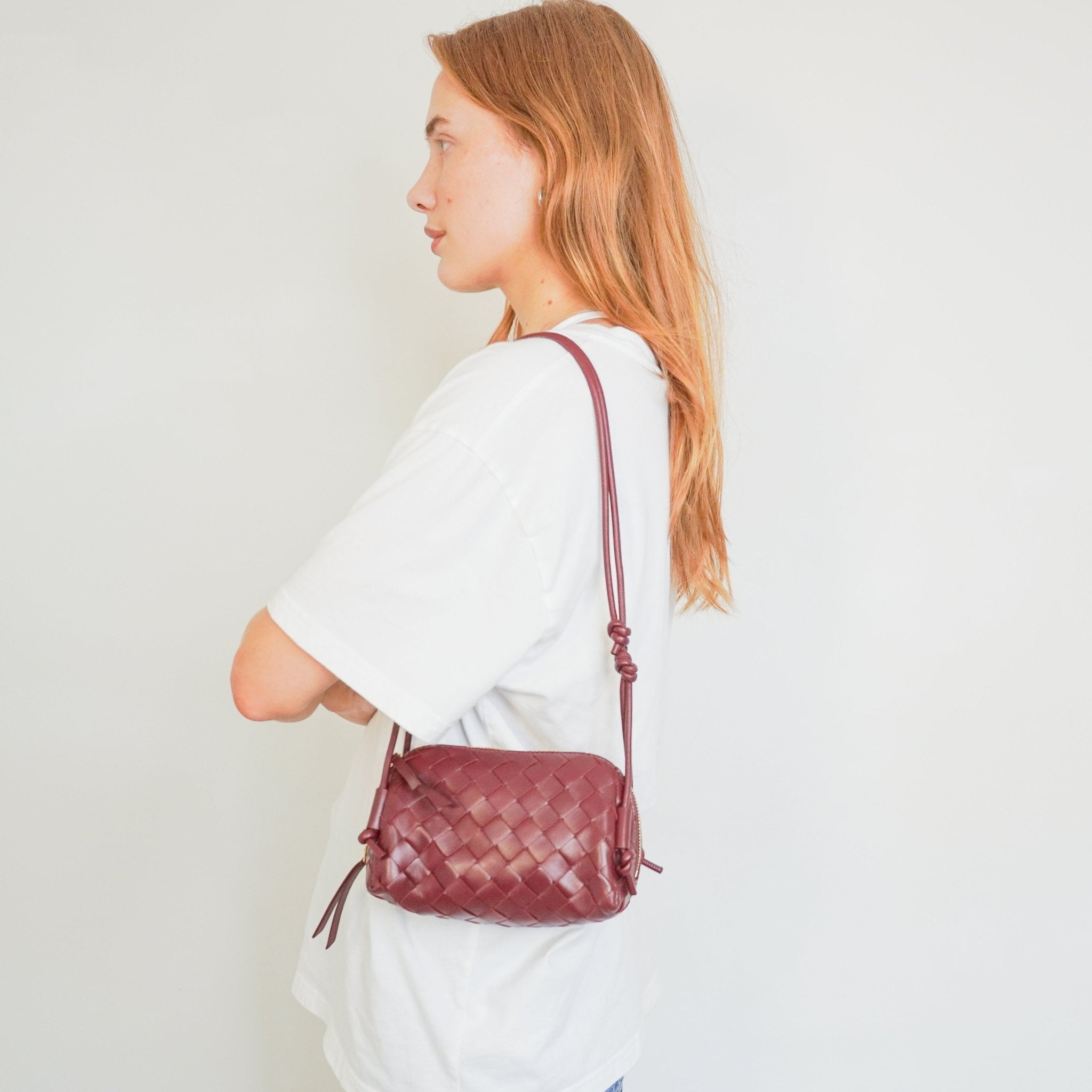 Bottega Veneta Intreciatto Concert Crossbody Bag in Burgundy (RRP £1730) | Authentic Preloved - Reloved Again