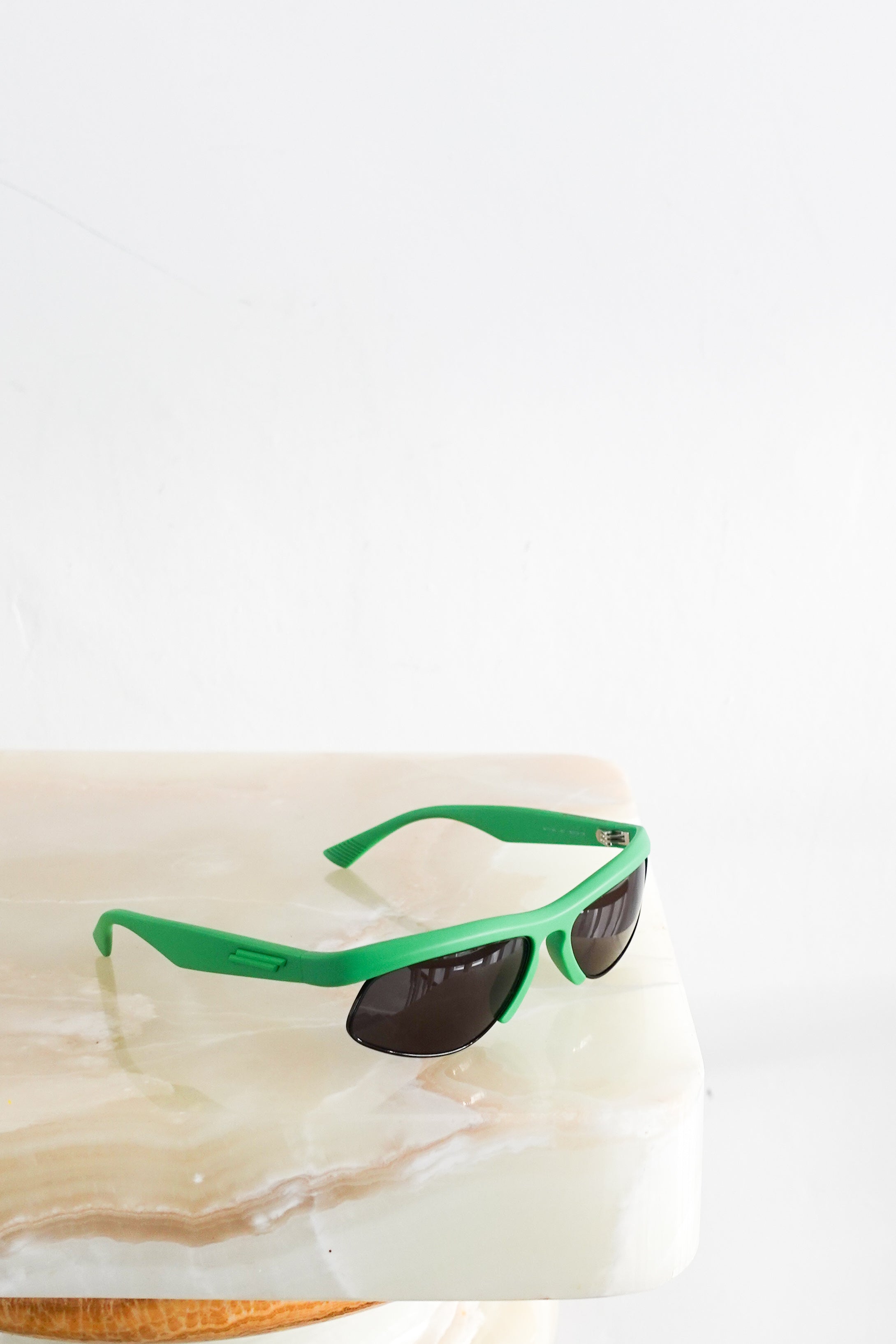 Green frame sunglasses RRP £200